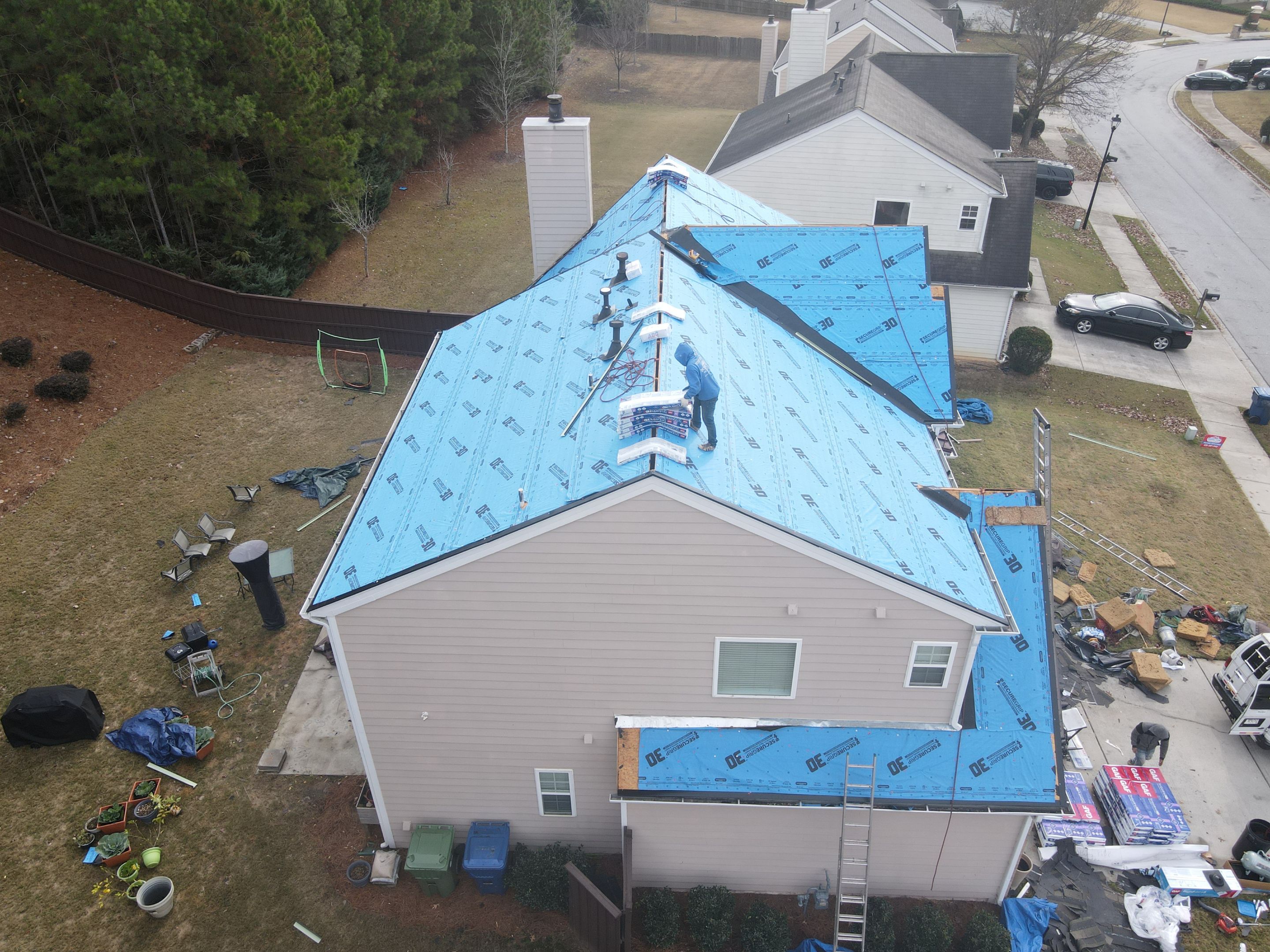 Residential Roofing Installation using Timberline HDZ Hickory  by Inspector Roofing and Restoration