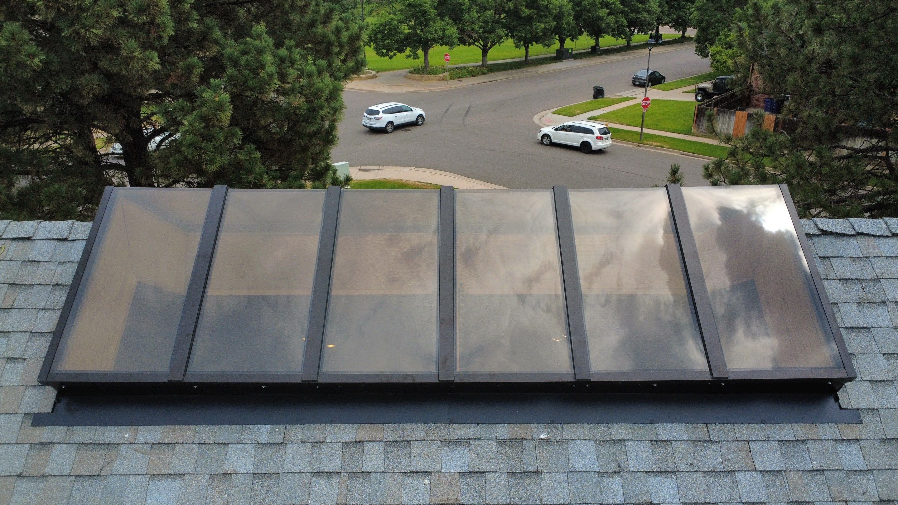 Asphalt Shingle and Skylight Replacement Project in Denver, CO by Blue Peaks Roofing LLC 