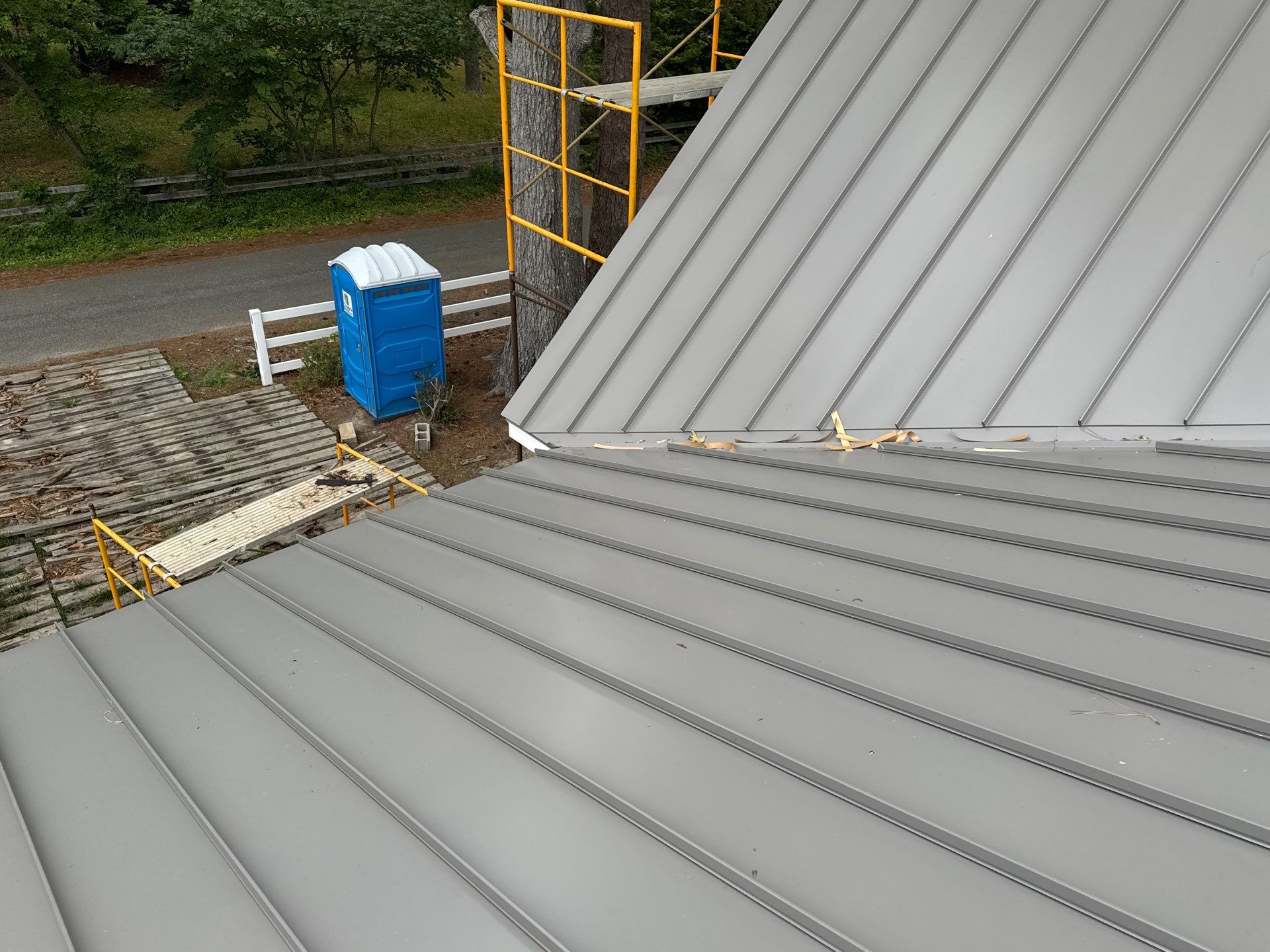 Custom New Construction Metal Roof Installation in Deltaville by Cade Construction