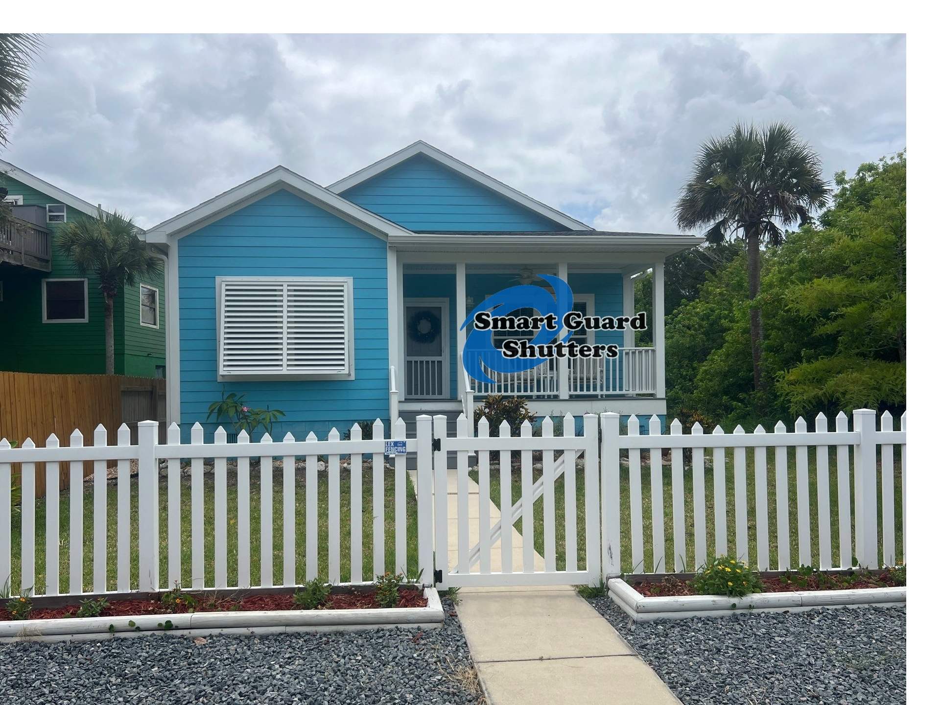 Impact Bahama Shutter in Signal White by Smart Guard Shutters