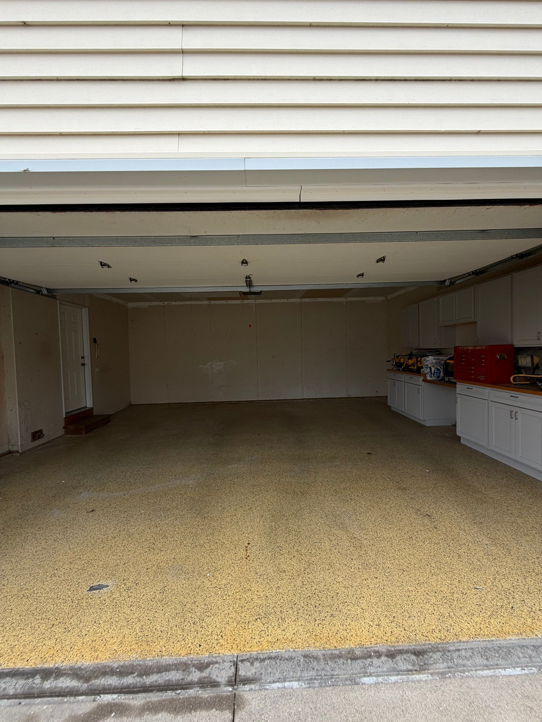 Ames Garage Floor Coating - Epoxy Replacement by Revival Concrete Coatings
