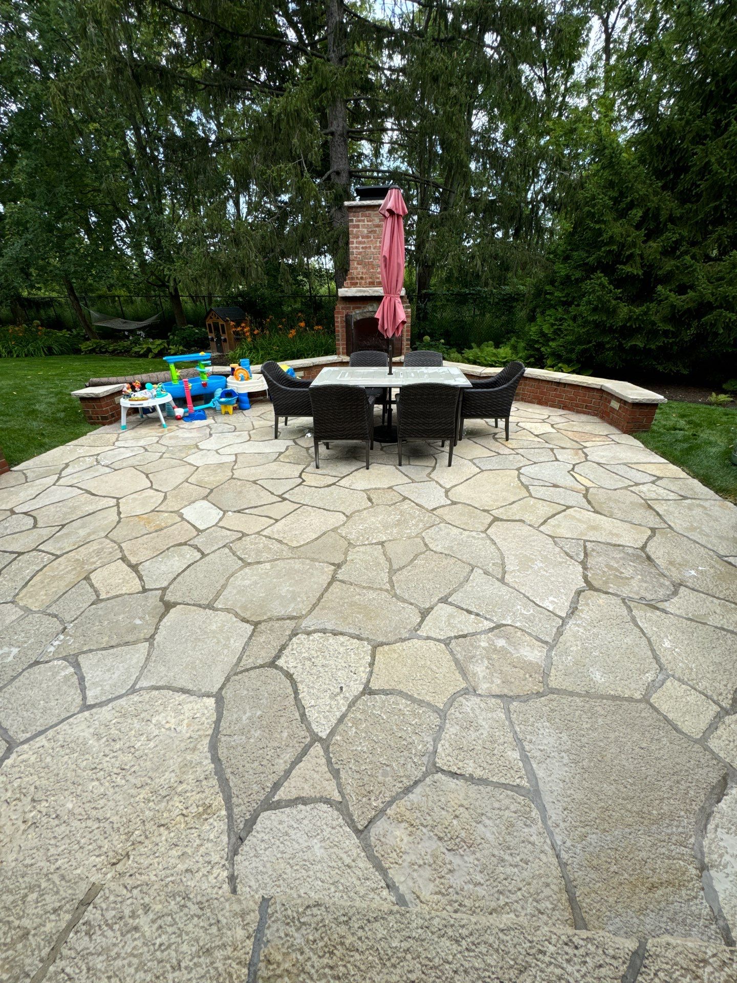 natural stone using Algaecide, soft wash soap by Northern Power Washing LLC.