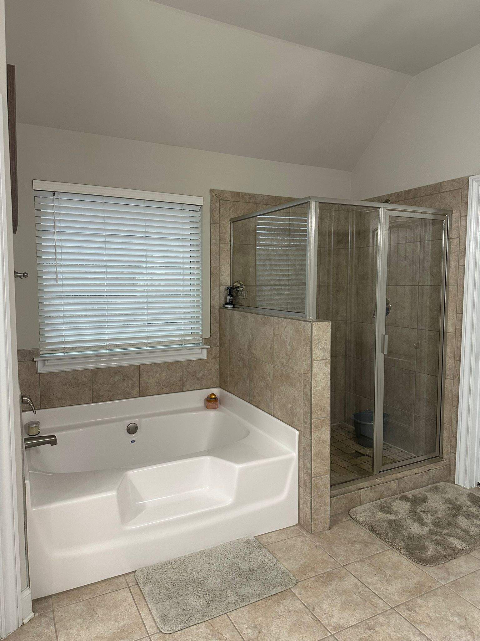 Shower retile and bathroom flooring by Prudencio