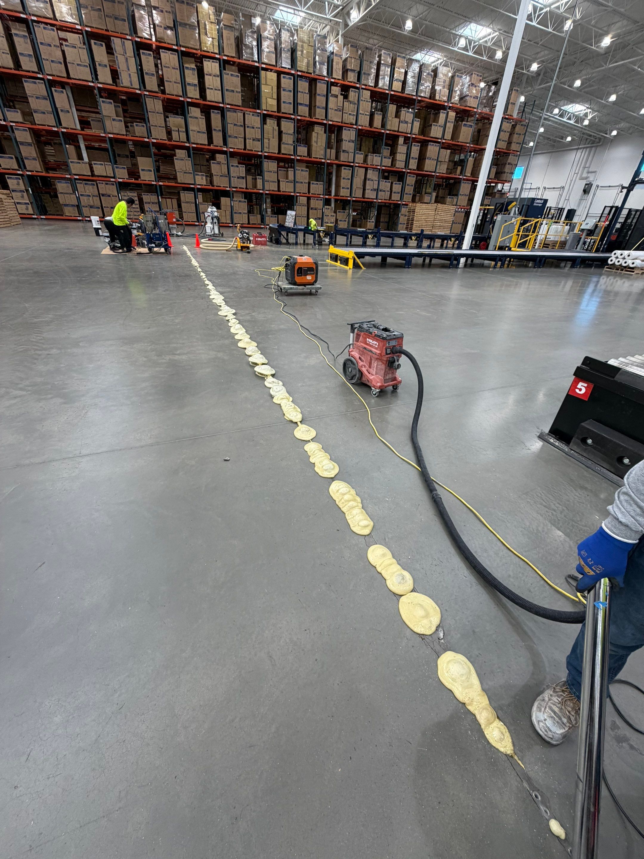 ULINE Stabilization of Deflecting Concrete Floor Panels in Ontario by Elite Concrete Restoration