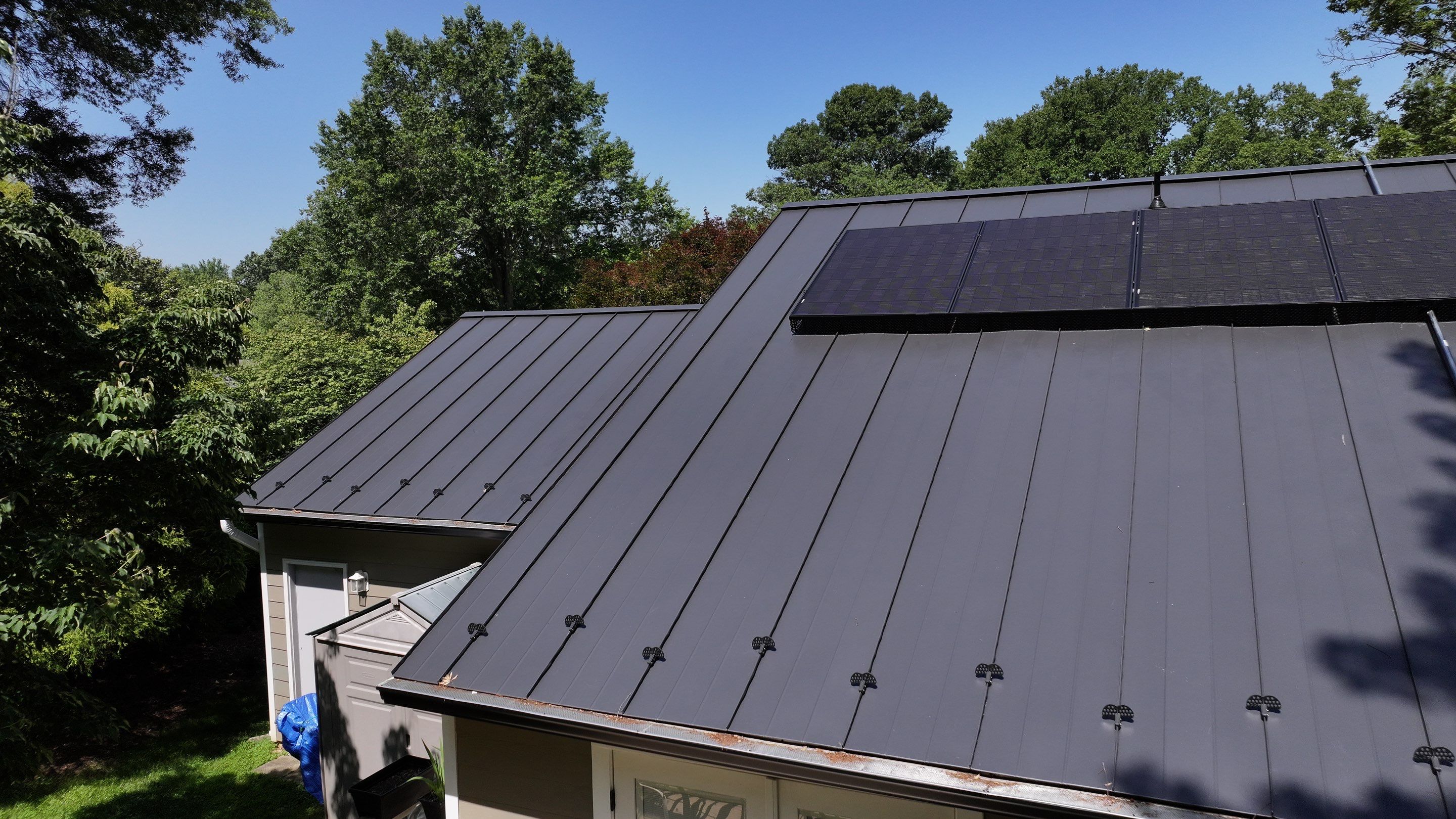 Metal Roof + REC Panels: A Solar Upgrade by American Home Contractors