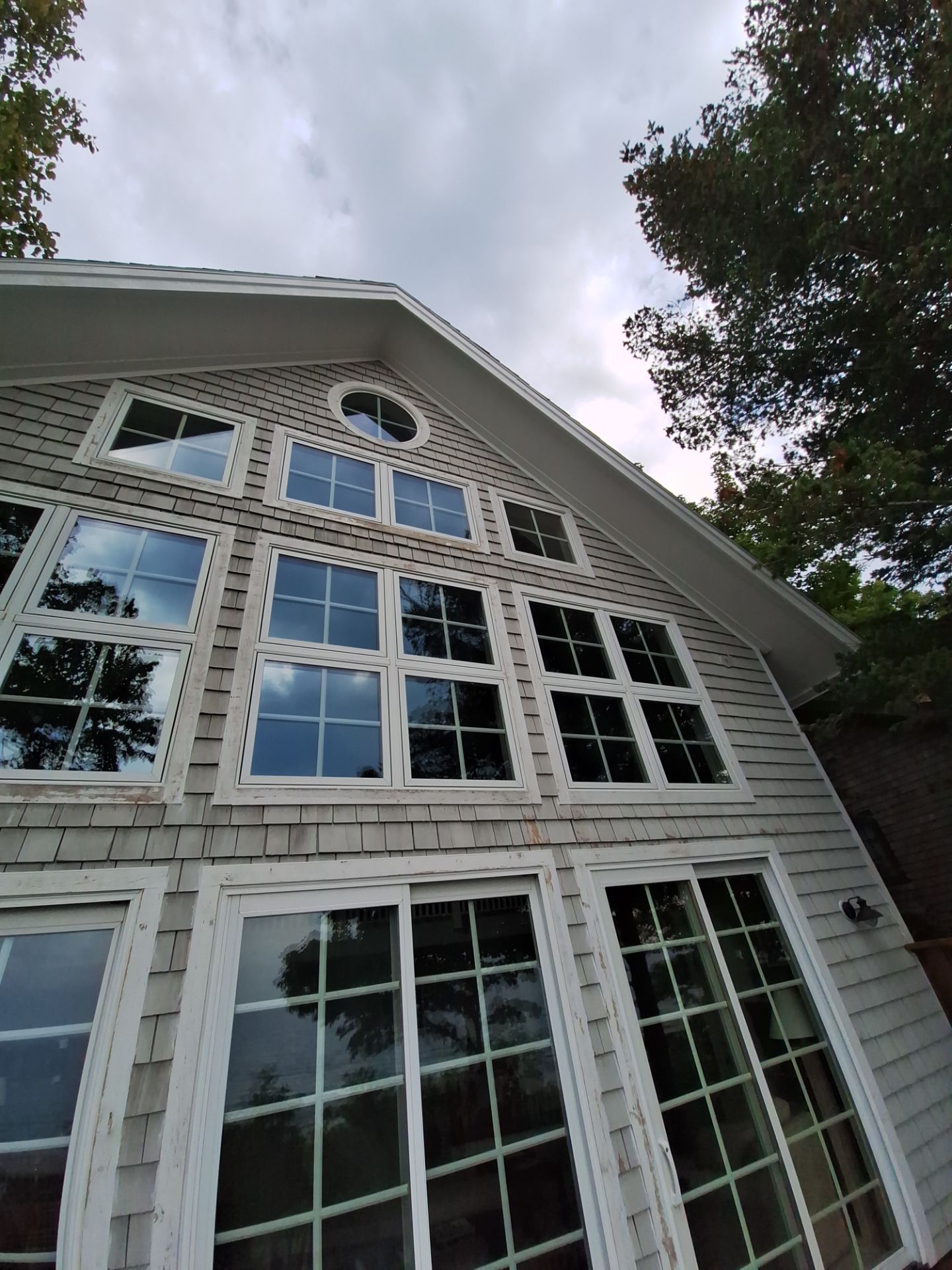 Lakefront Deck Pressure Washing, Exterior Wood Staining, and Painting in West Olive MI by Gordon Painting