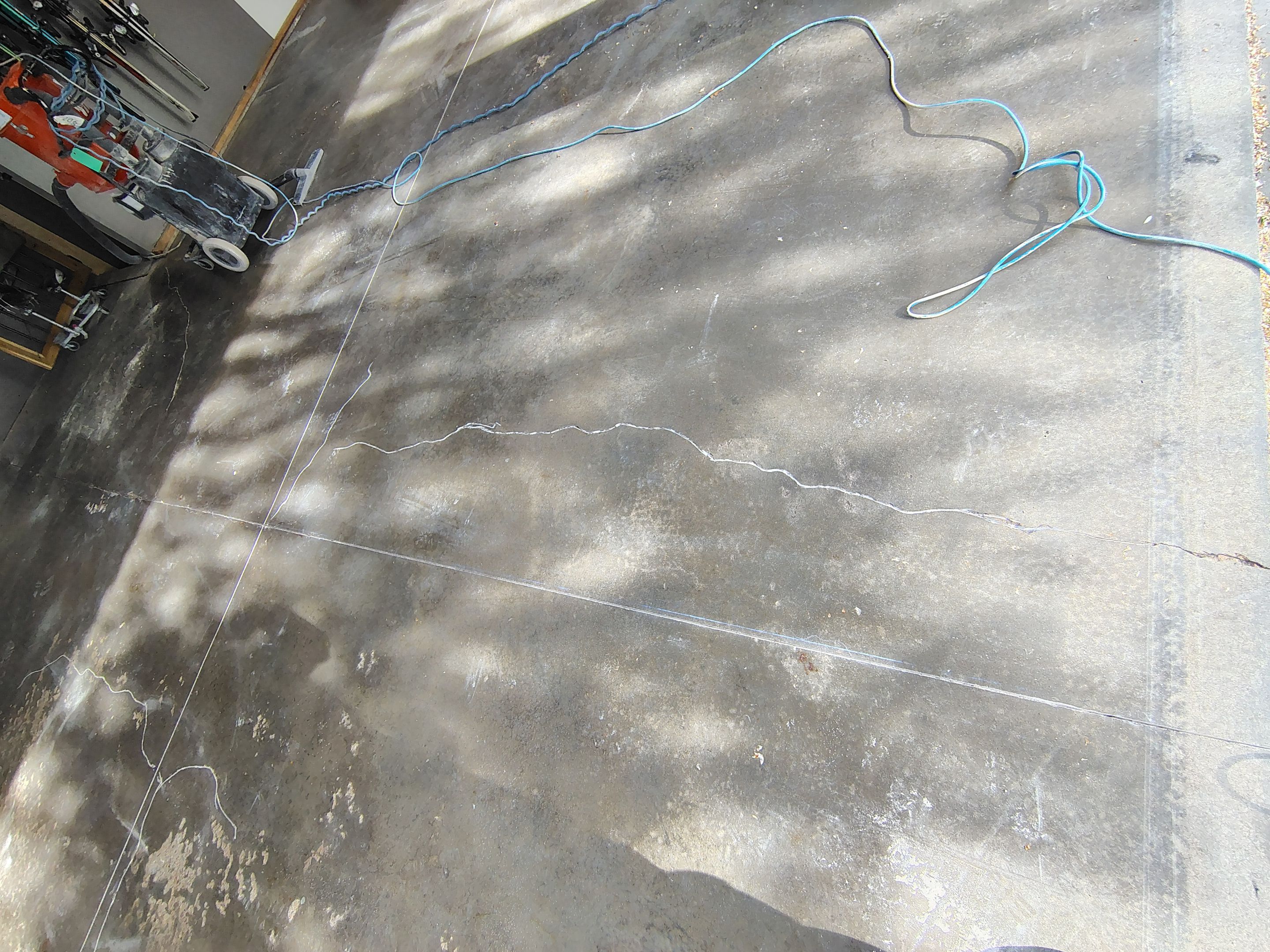Garage Floor Concrete Coating and Crack Repair in Sioux Falls by Select Painting, Coatings & Garage Cabinets