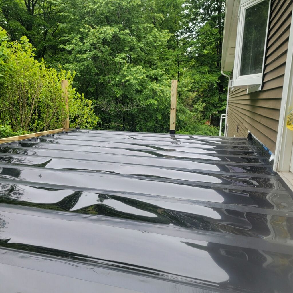 Deck replacement using Trex Lineage Rainier, Cocktail Rail, Rainescape by DiGiorgi Roofing and Siding Inc