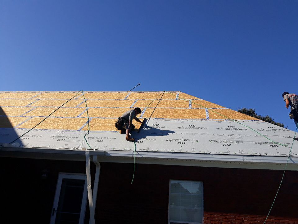 Residential Roofing Installation using Roof Replacement by American Roofing & Construction LLC