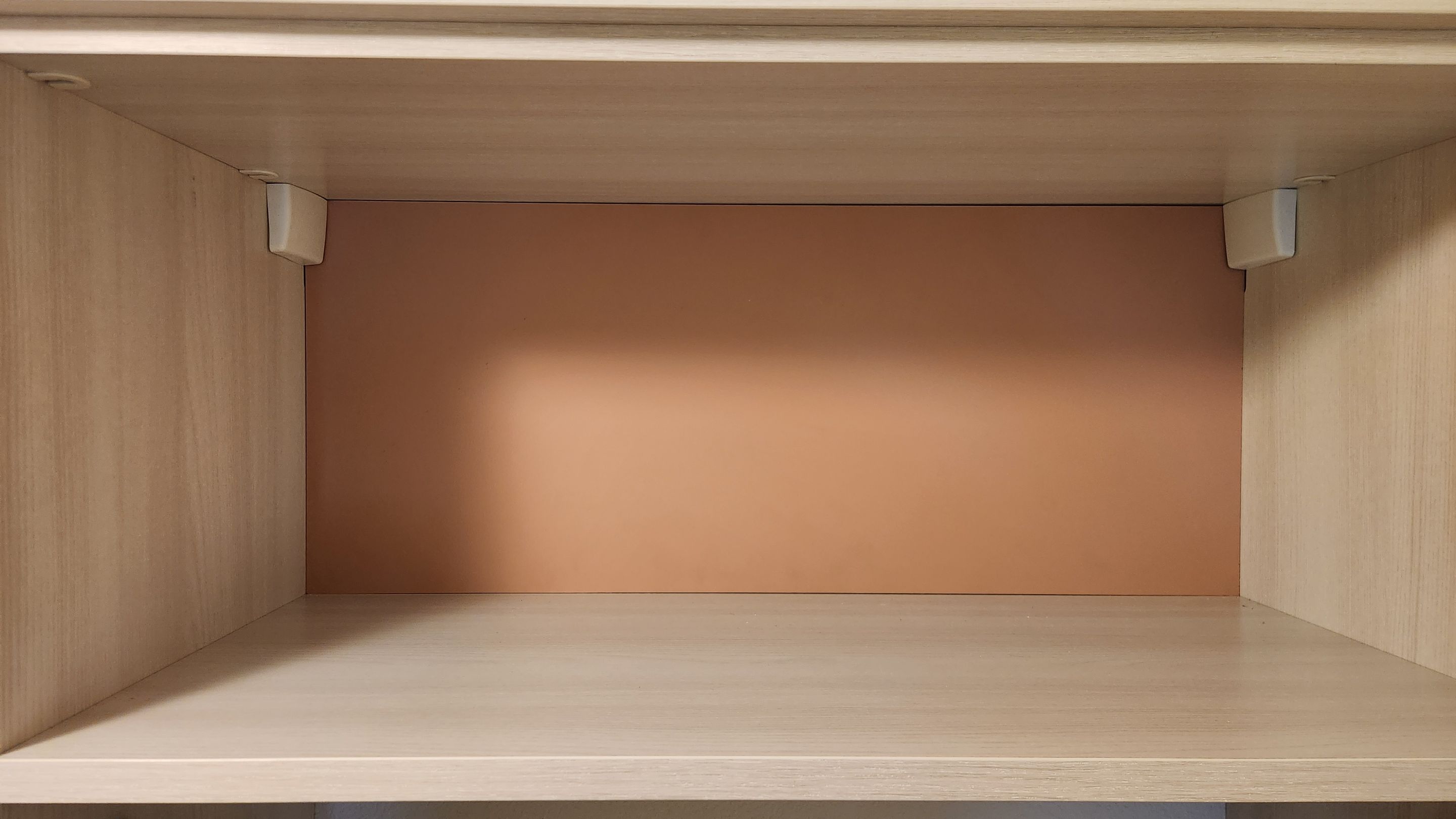 Laundry Room designed to match closets by Concept 32, Inc.