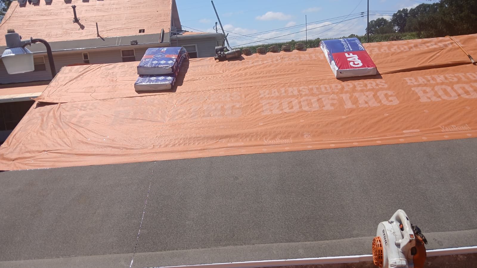 Residential Roofing Installation using GAF Timberline HDZ Fox Hollow Grey by Rainstoppers Roofing