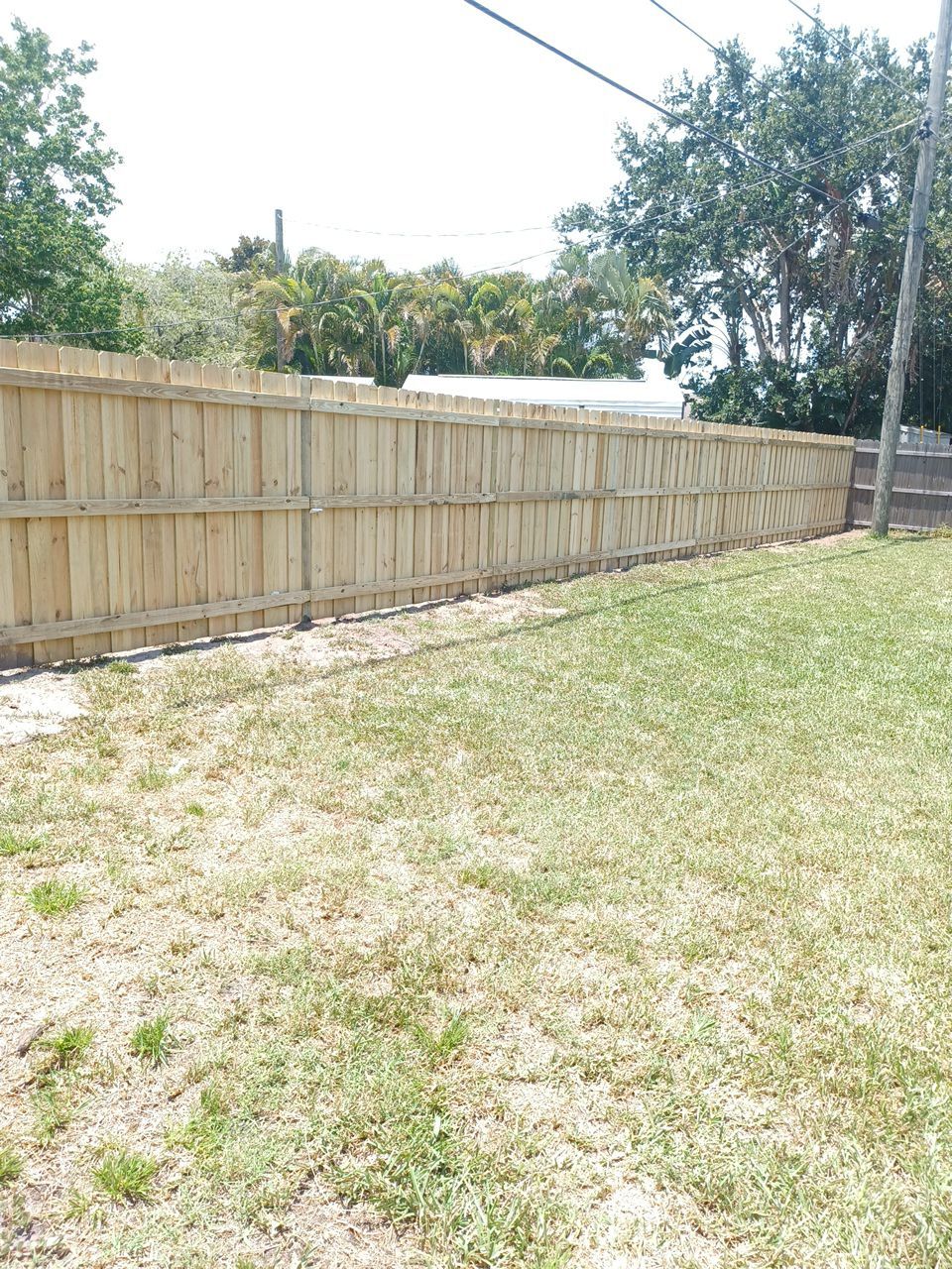 Bradenton, FL 6ft. Treated Board on Board Privacy Fence by Asap fence and gates, LLC