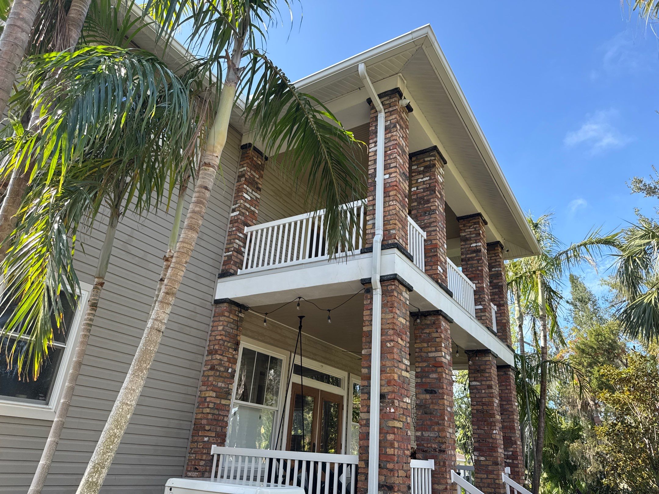 2-Story House Wash and Garage Pressure Washing in Palmetto, FL by Sunshine AquaWash