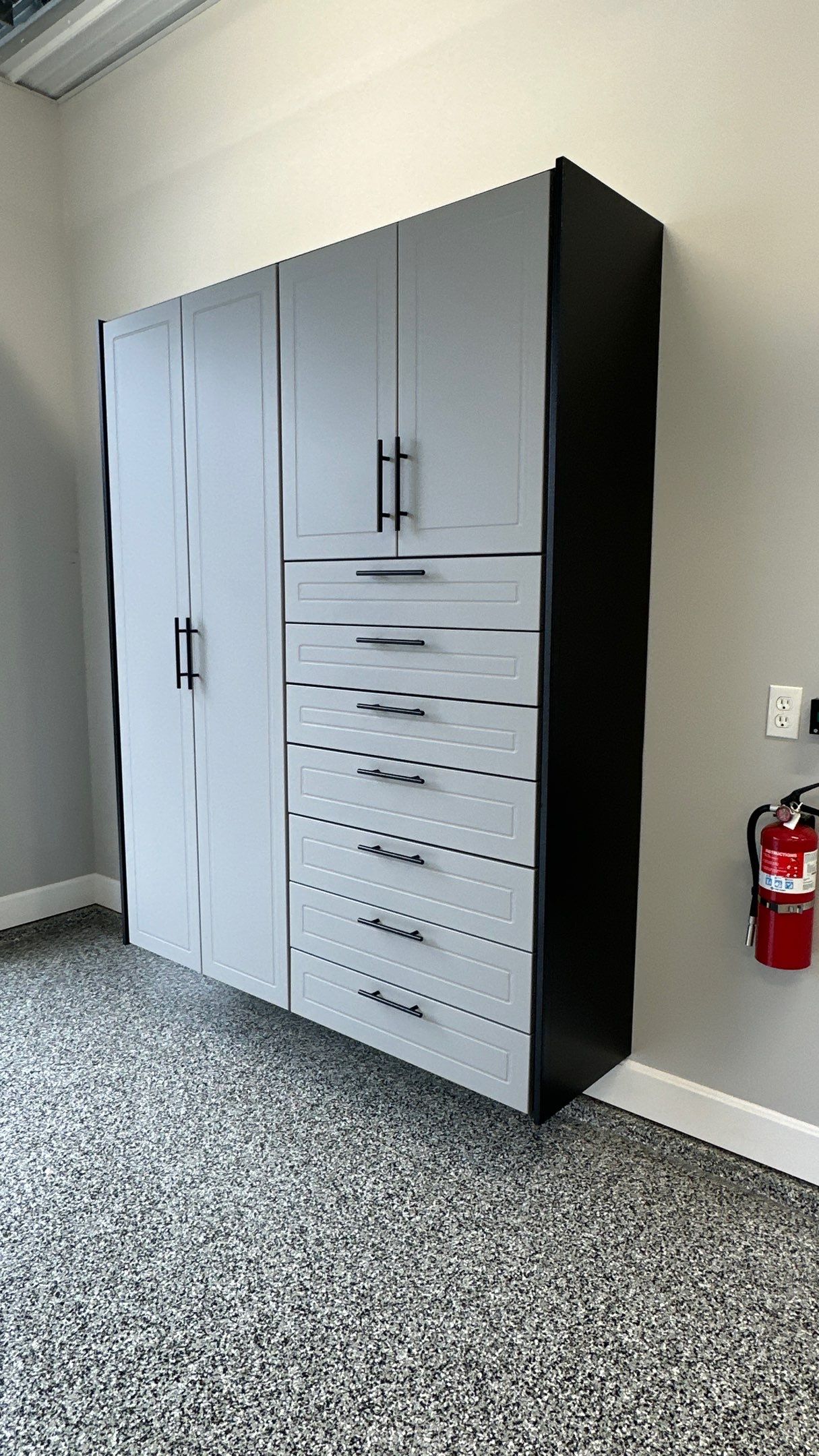 Pat F upgraded his garage with a cool Two-tone cabinet setup by Banner Garage