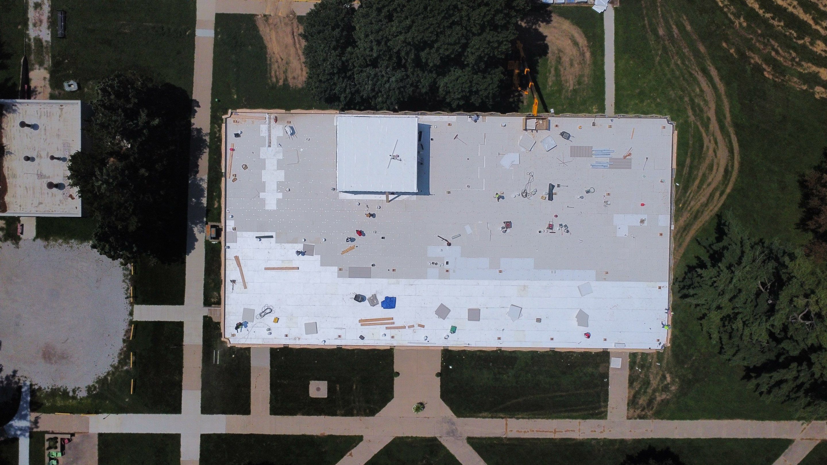 Commercial Flat Roof IB PVC Install  by Titan Commercial & Residential Roofing 
