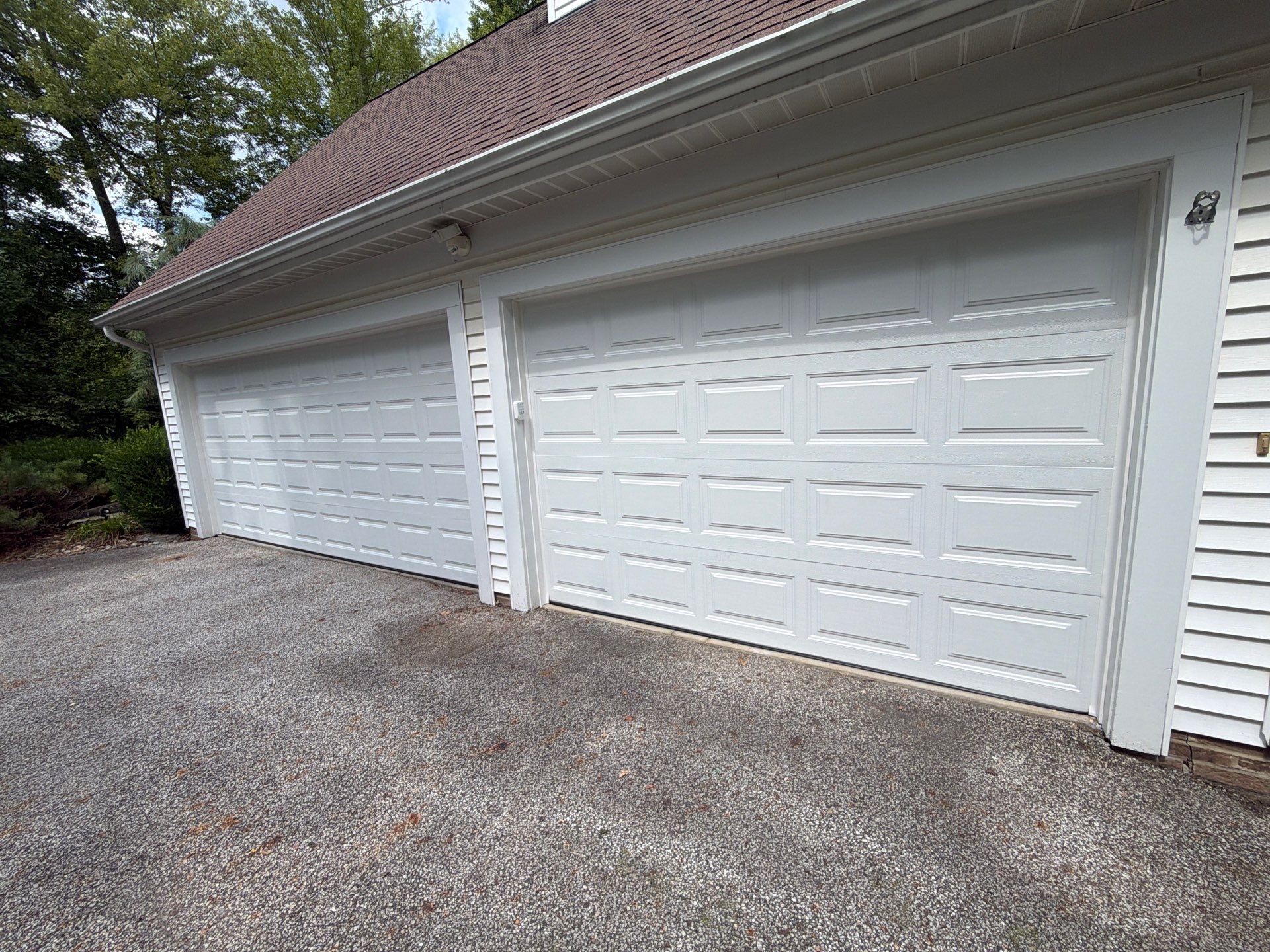 White Raised Panel Sectional Garage Door Installation in Solon by Ohio Garage Door Repair