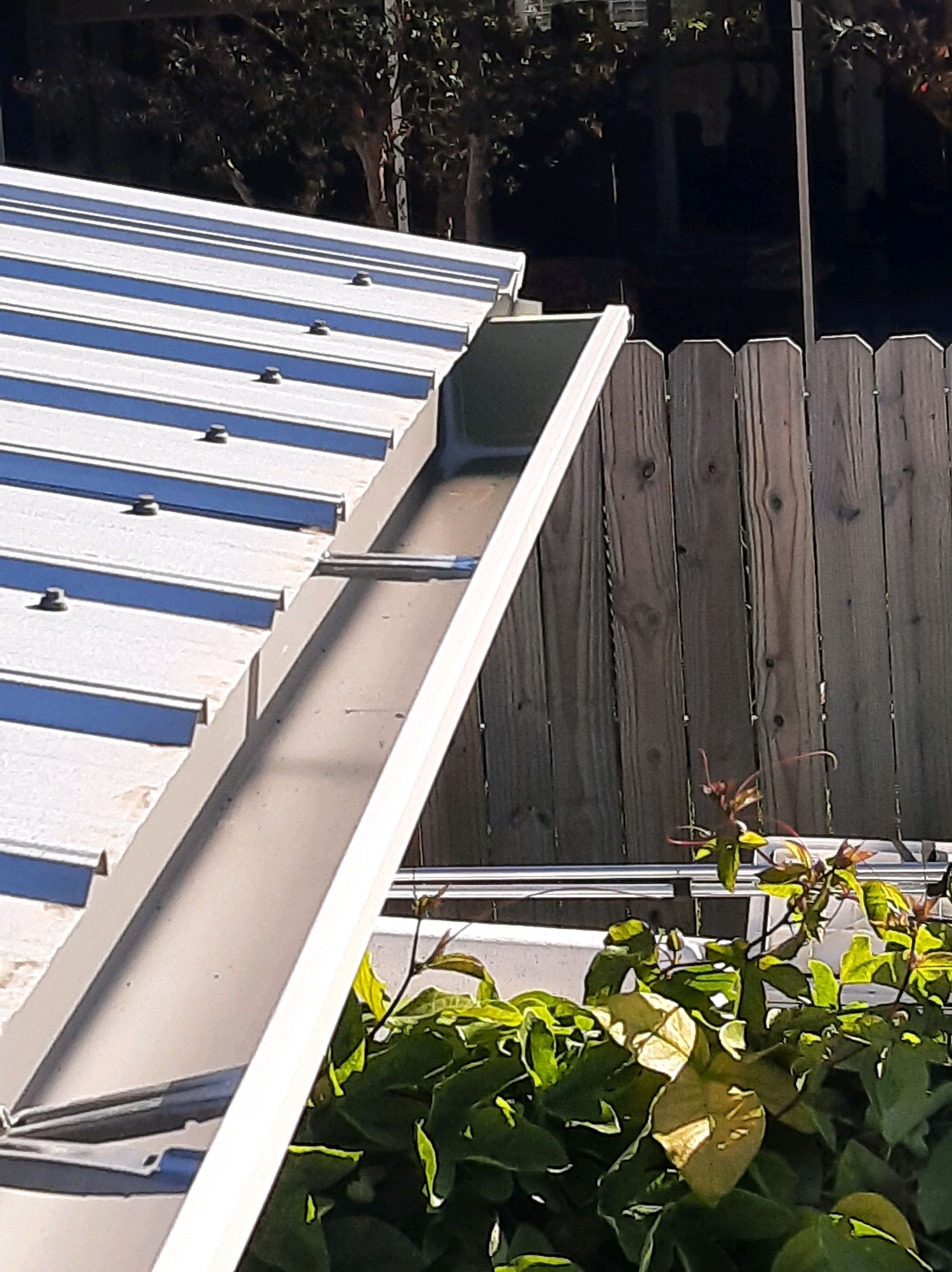 Gutter Installation using K-Style Seamless Gutters and Soffit and Fascia Replacement by Gutter Professors