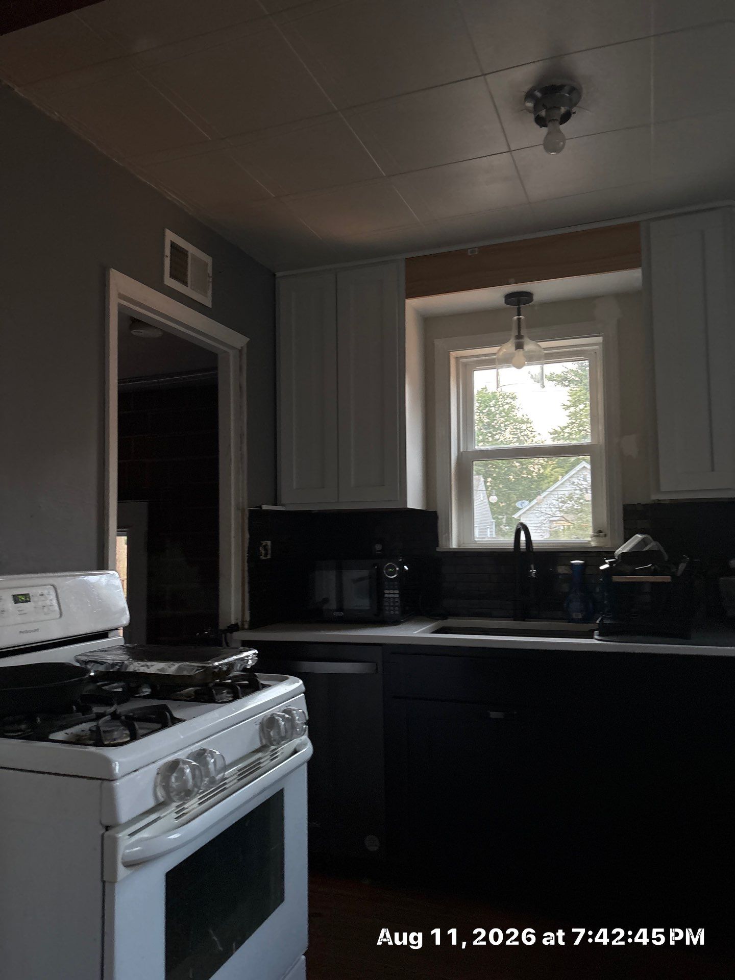 Two-Tone Kitchen Remodel with Black Subway Tile in Lincoln by CompanyCam Sales Demo