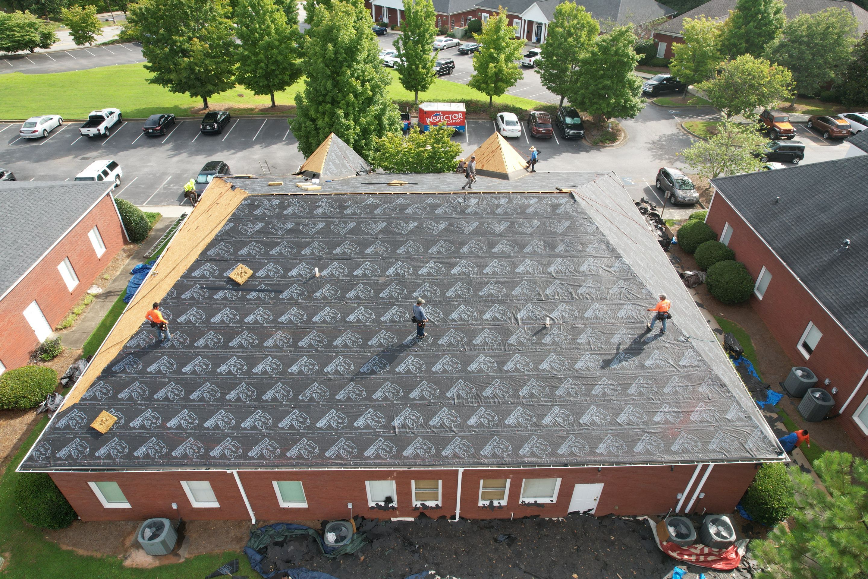 Commercial Roof Replacement using Owens Corning by Inspector Roofing and Restoration