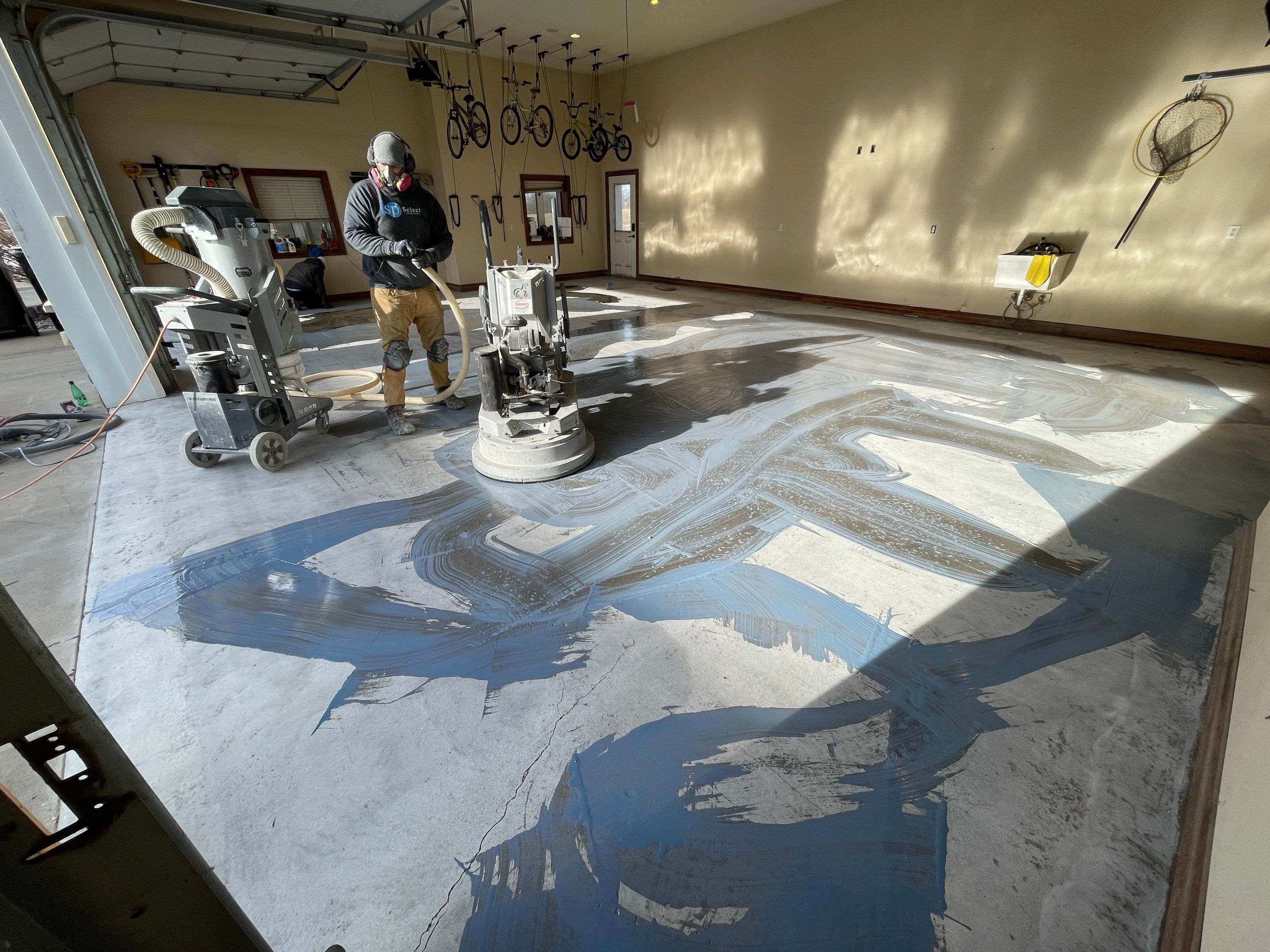 Garage using Slate Stone by Select Painting, Coatings & Garage Cabinets