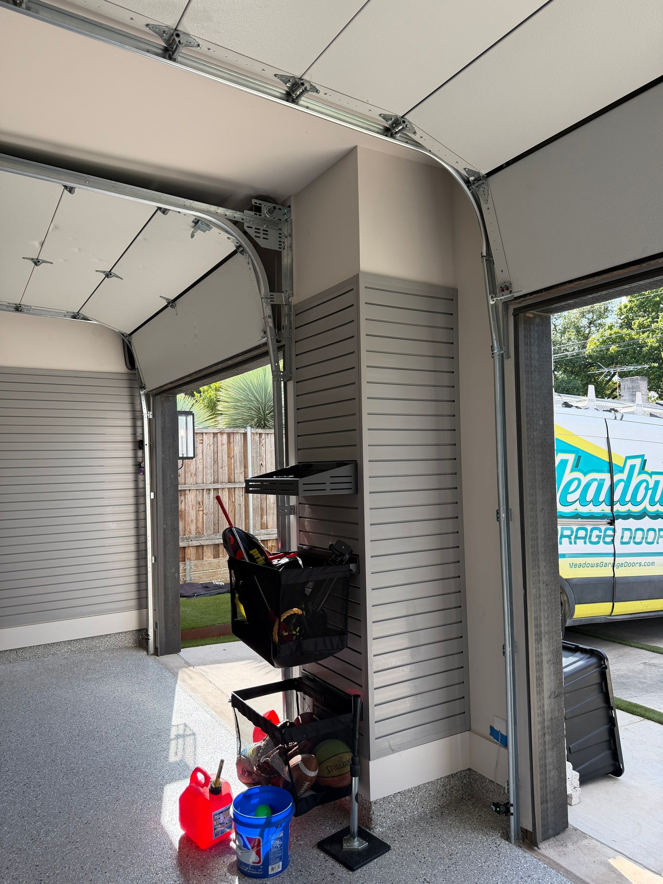 High-Lift Garage Door Conversion and LiftMaster Opener Installation in Dallas by Meadows Garage Doors