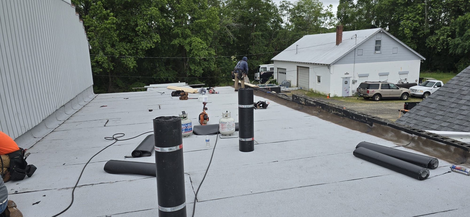 Roof Installation using Silicone APP Elevate Coating by ExteriorPros