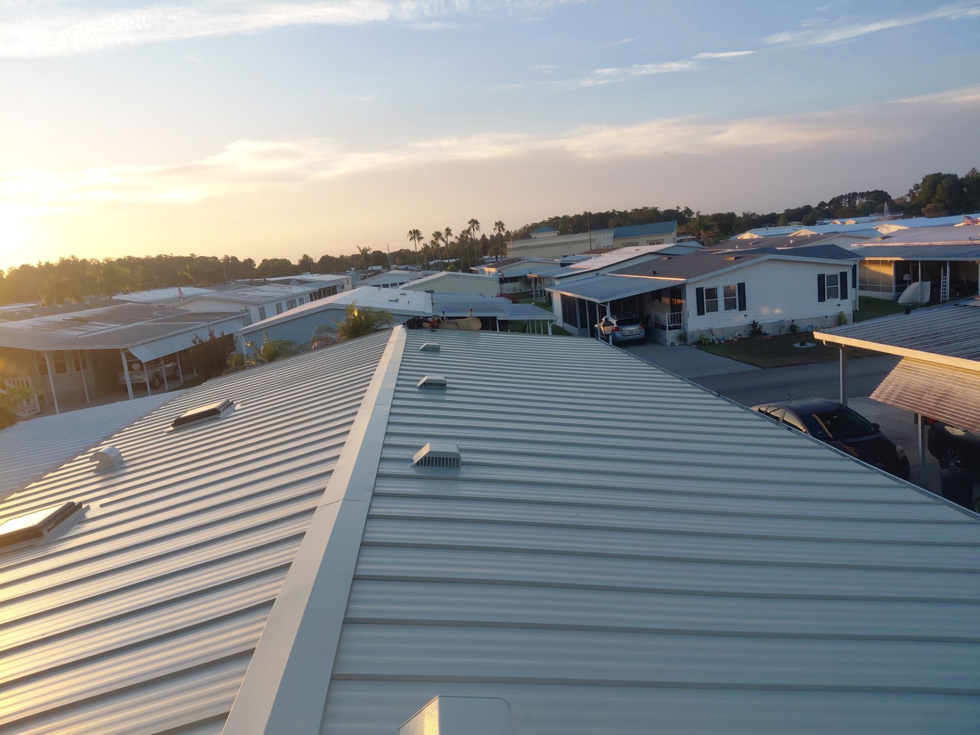 Orlando Residential Standing Seam Metal Roof Installation in Light Stone by Pinnacle Roofing Group