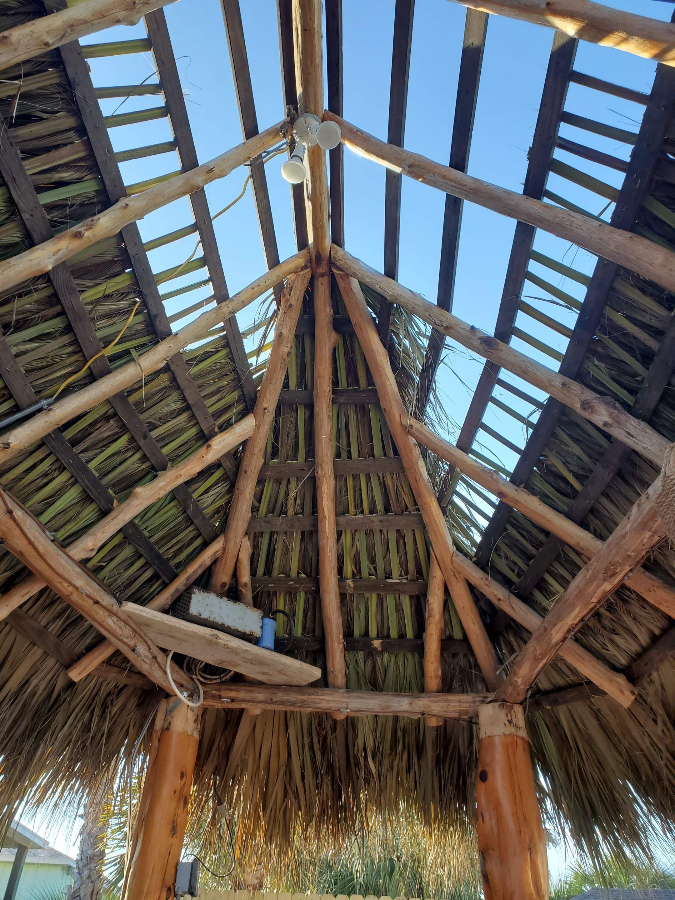 Poolside paradise by Bayfront Roofing and Construction