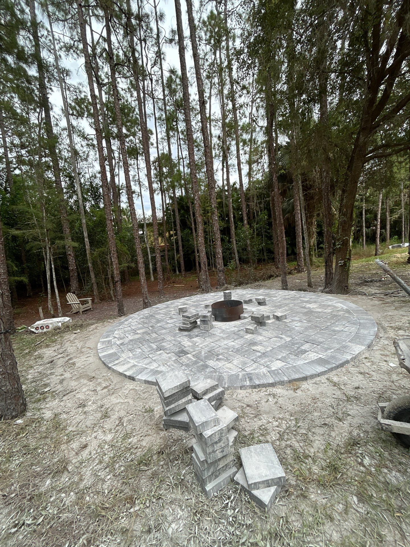 Fire pit and seating area/Oaks Blvd Naples by Old Town Pavers Llc
