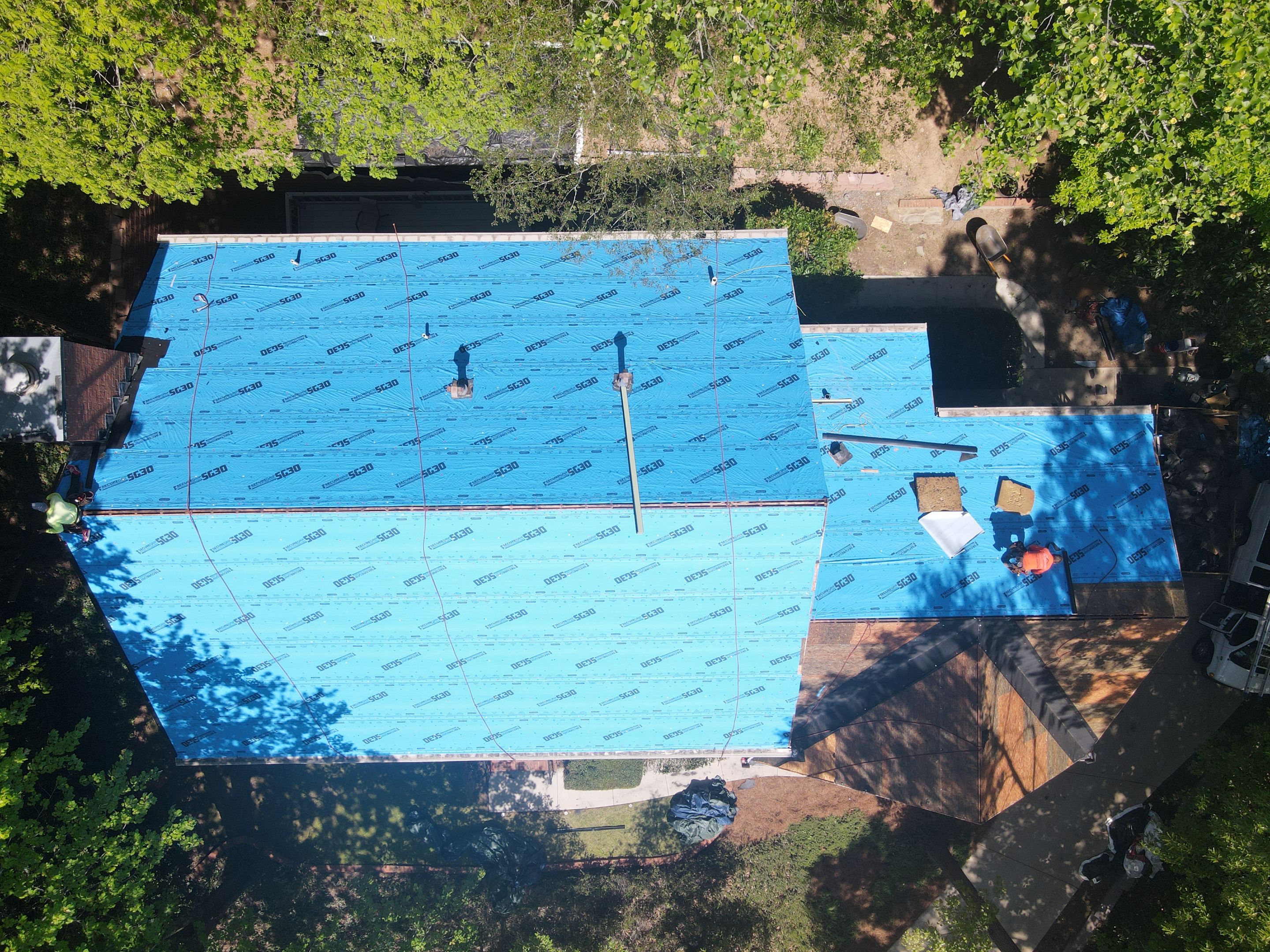 Residential Roofing Installation using Owens Corning Quary Gray by Inspector Roofing and Restoration