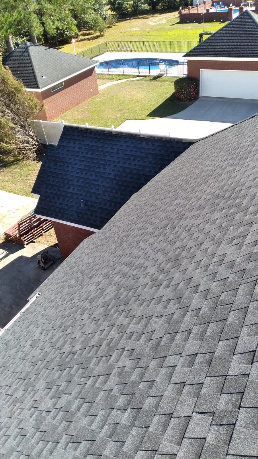 Residential Roofing Installation using Roof Replacement by American Roofing & Construction LLC