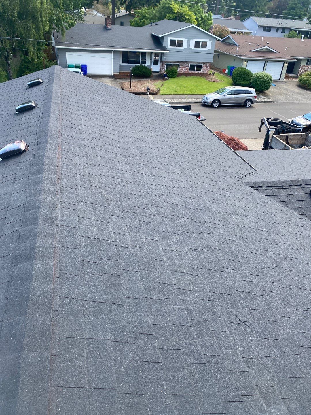 Onyx Black Shingles by Reimagine Roofing