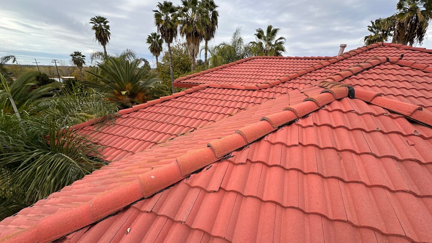 Tile refurbish project using existing tiles and replaced underlayment and battens by Straight Edge Roofing Inc