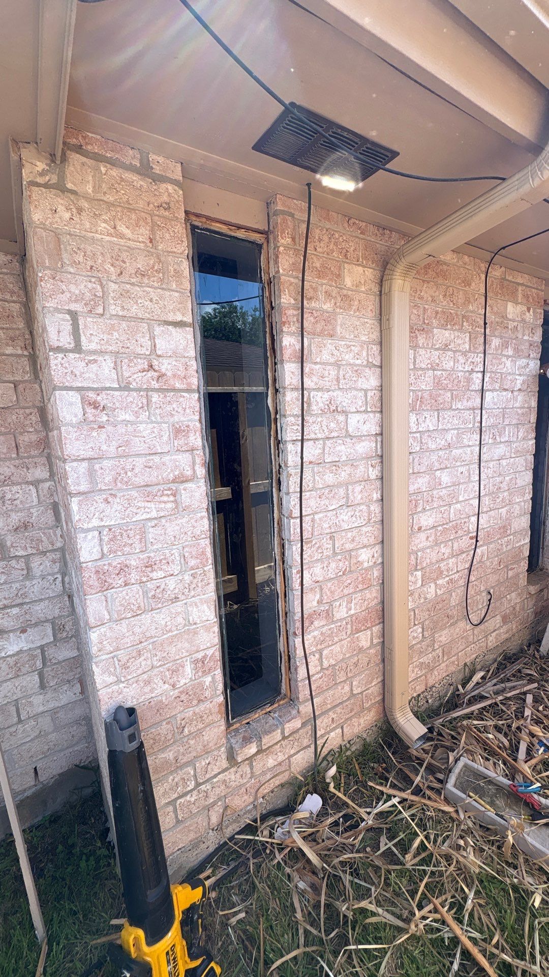 Colored Vinyl Windows to blend into brick by Bayfront Roofing and Construction