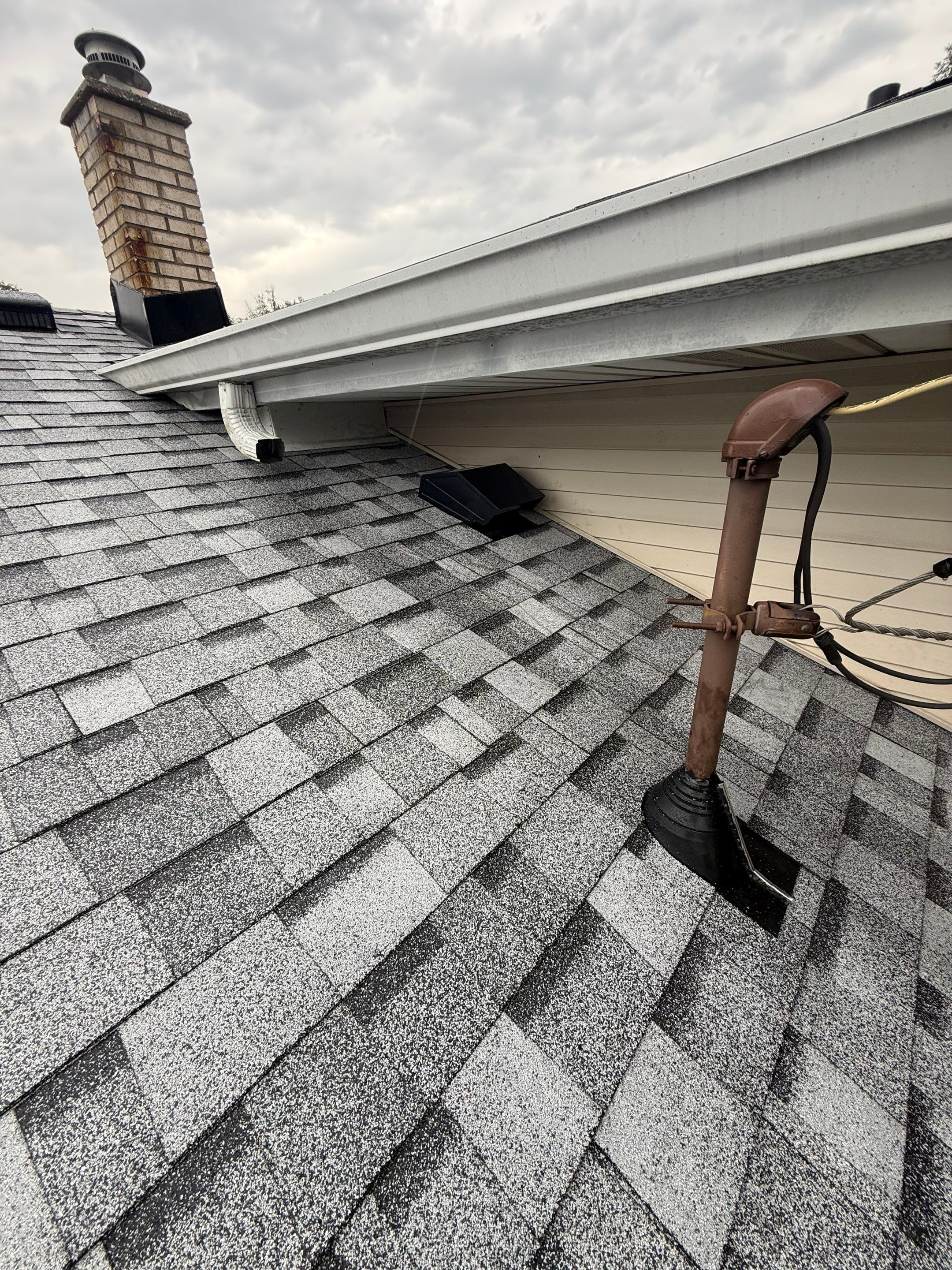 Roofing & gutters by Optimal Home Improvement 