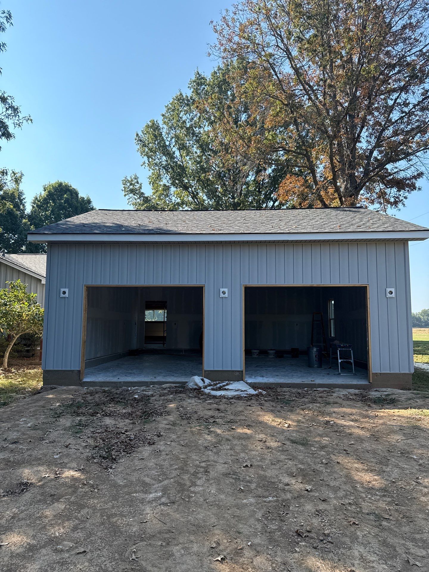 Sunroom and Garage Addition by Skilled Construction LLC