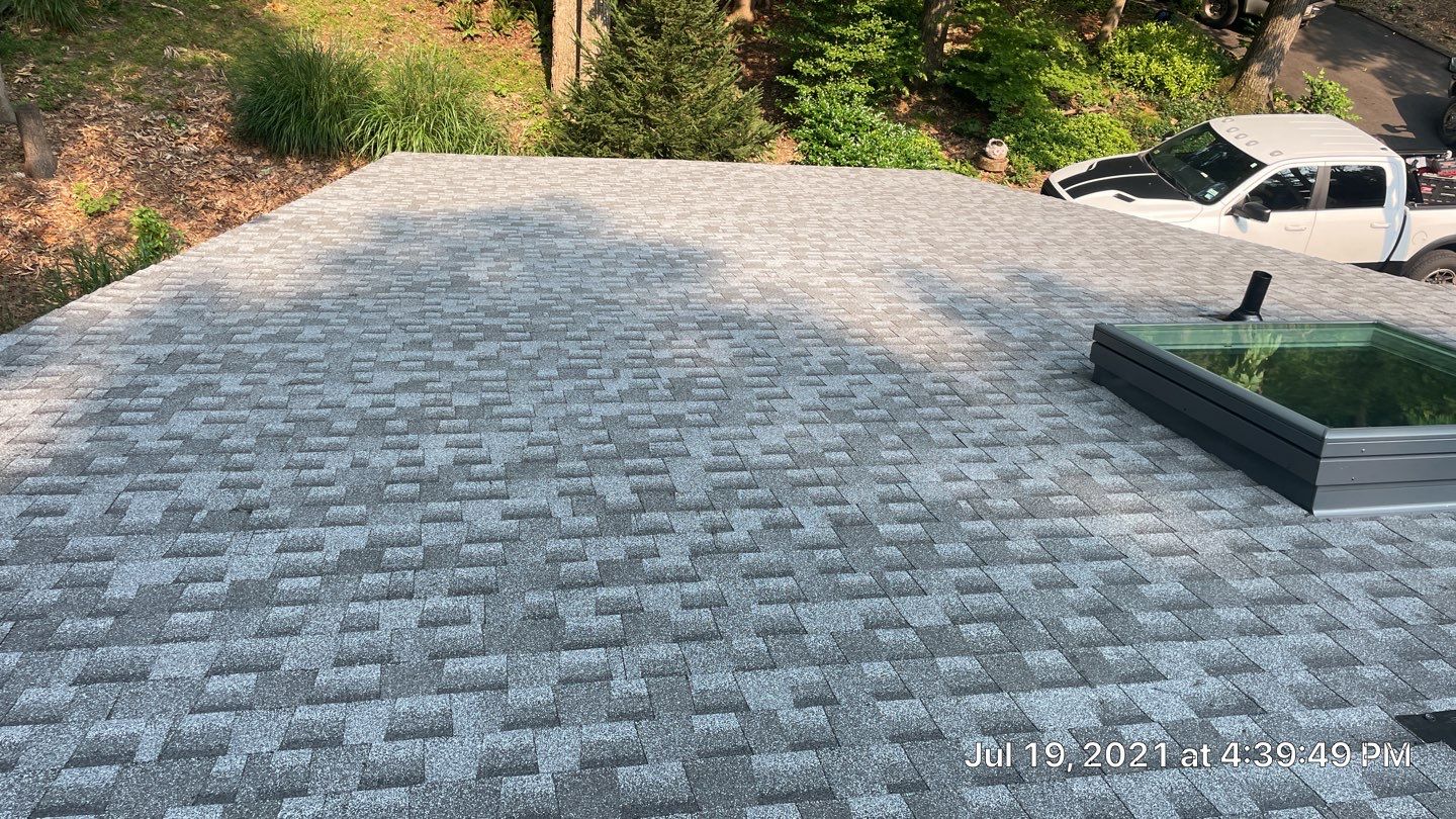 Deckhouse Roof Replacement by American Home Contractors