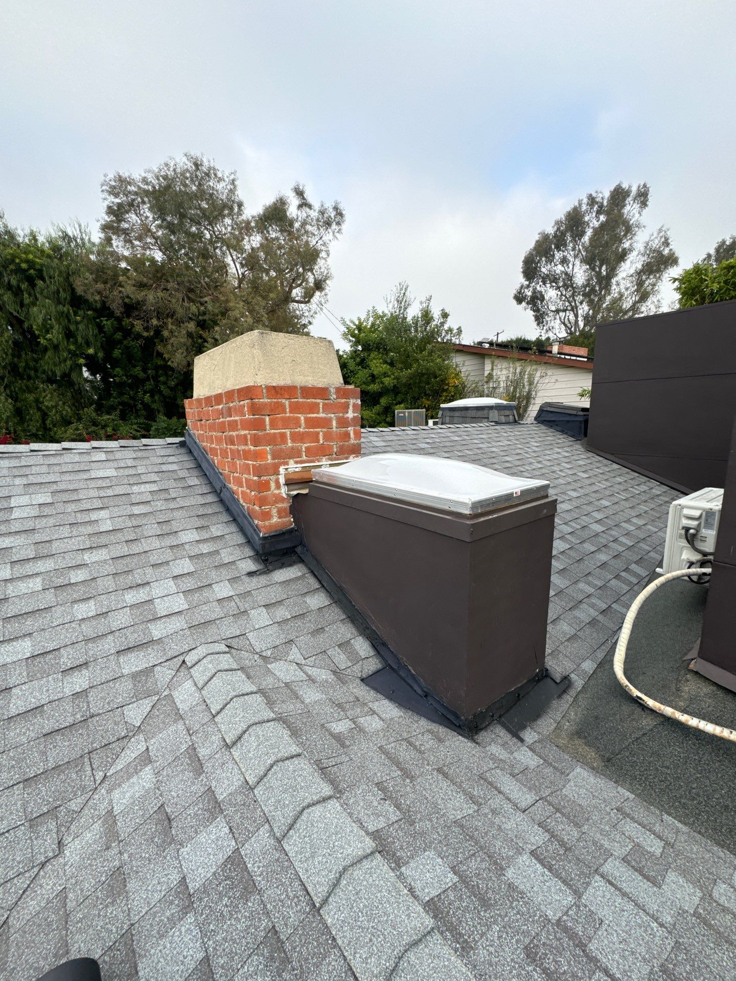 Residential Roofing Installation using Shingles and Silicone by Hull Brothers Roofing