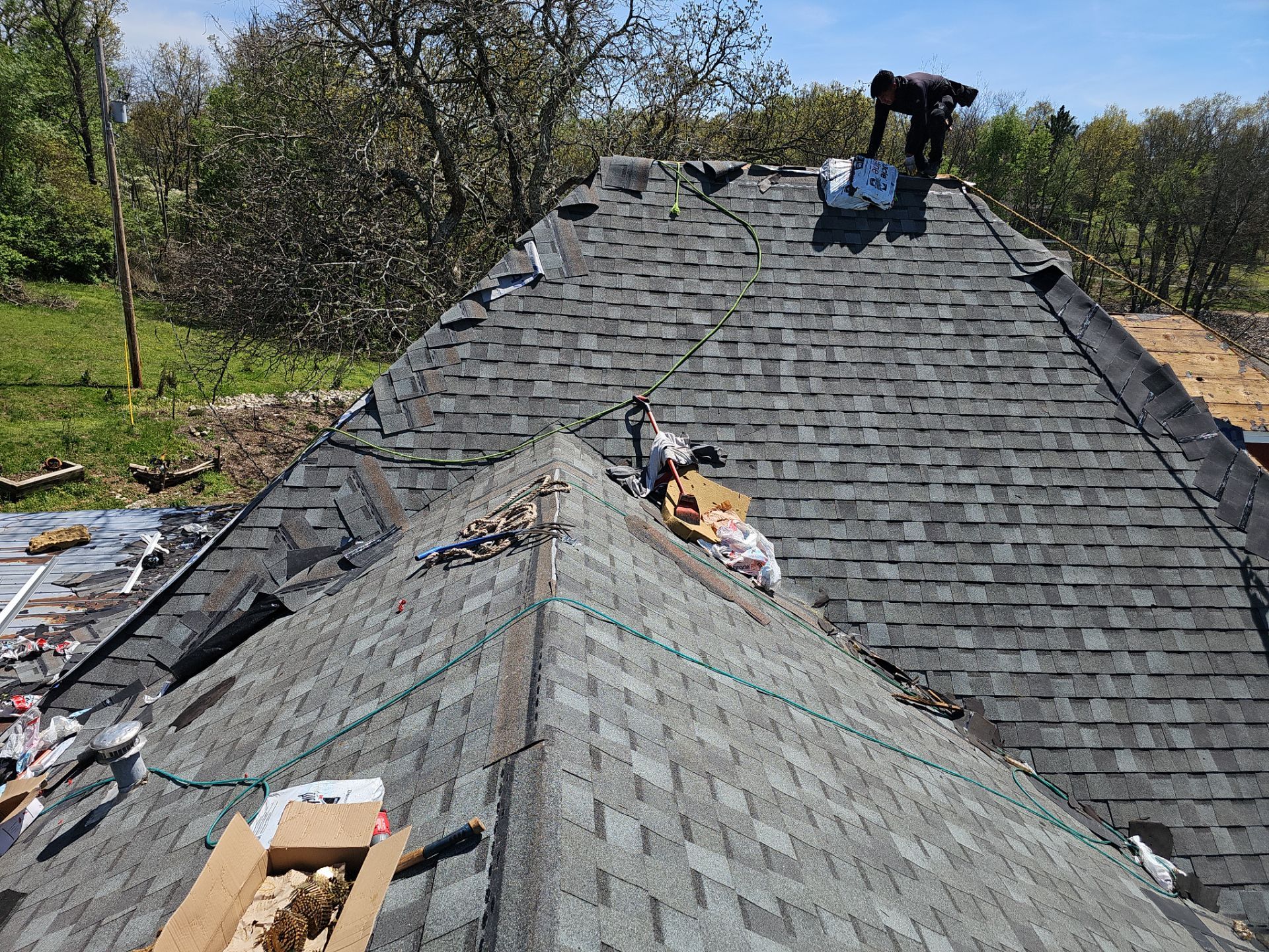 Residential Roof + Gutters & Downspouts Install  by Titan Commercial & Residential Roofing 