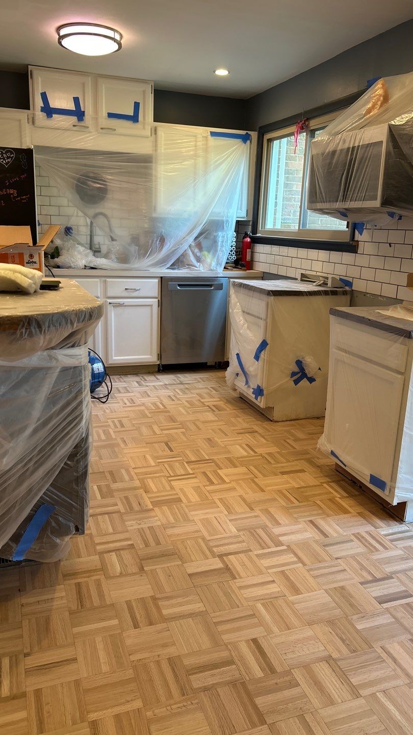 Parquet floor and stair treads by Footprints Floors of Nashville