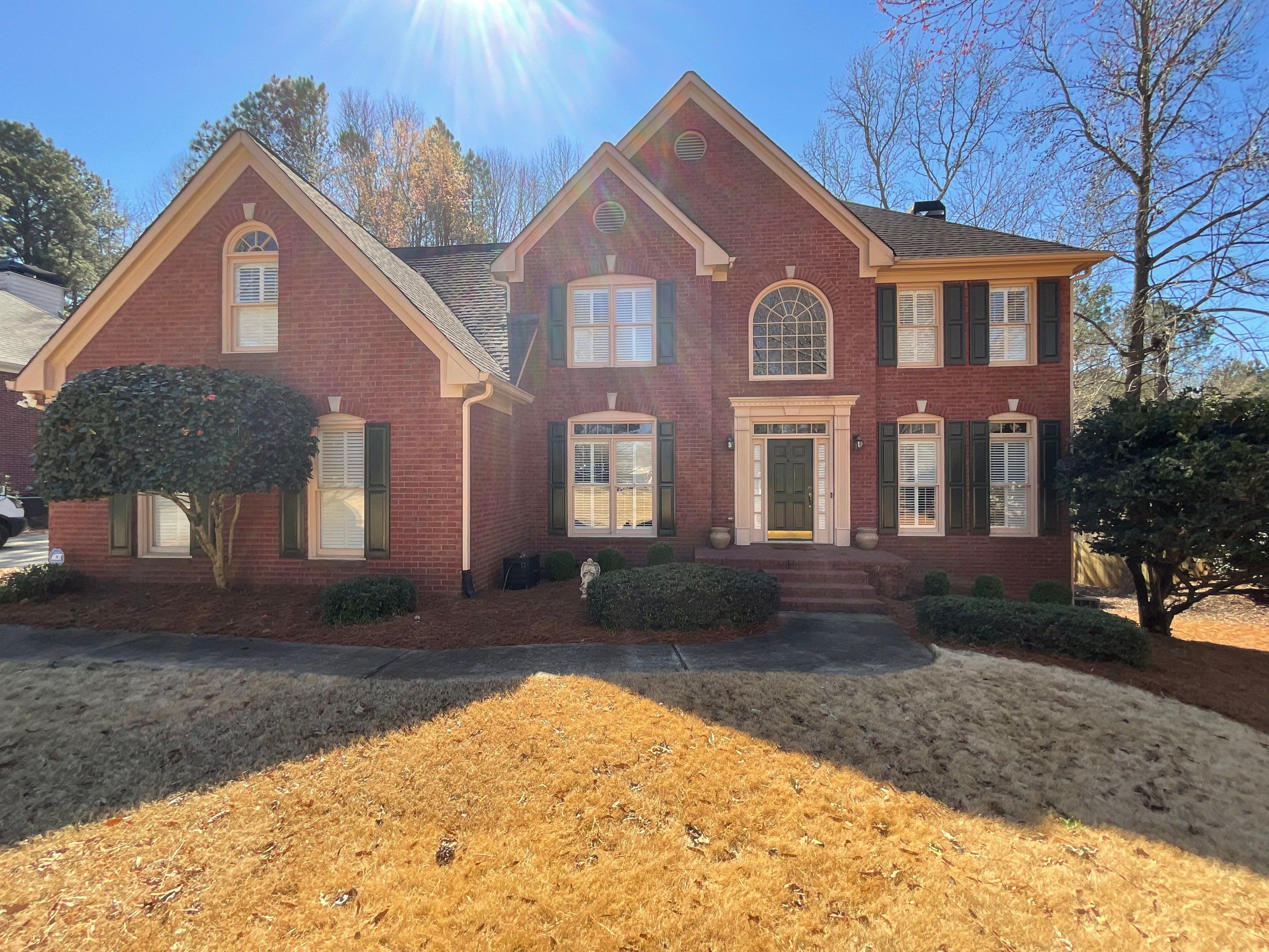 Exterior Painting and Trim Refresh for Suwanee Brick Home by Swift Home Renovations