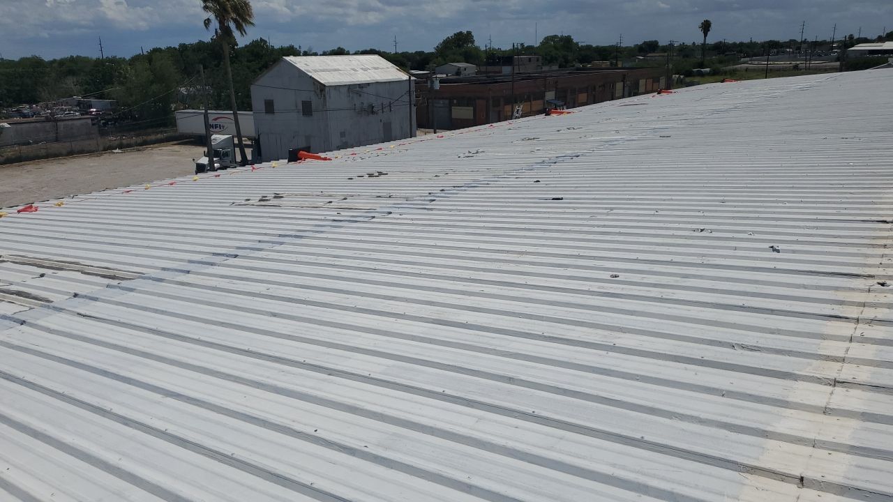 Commercial Roofing Installation using GAF 10 Year Acrylic System by Lighthouse Roofing