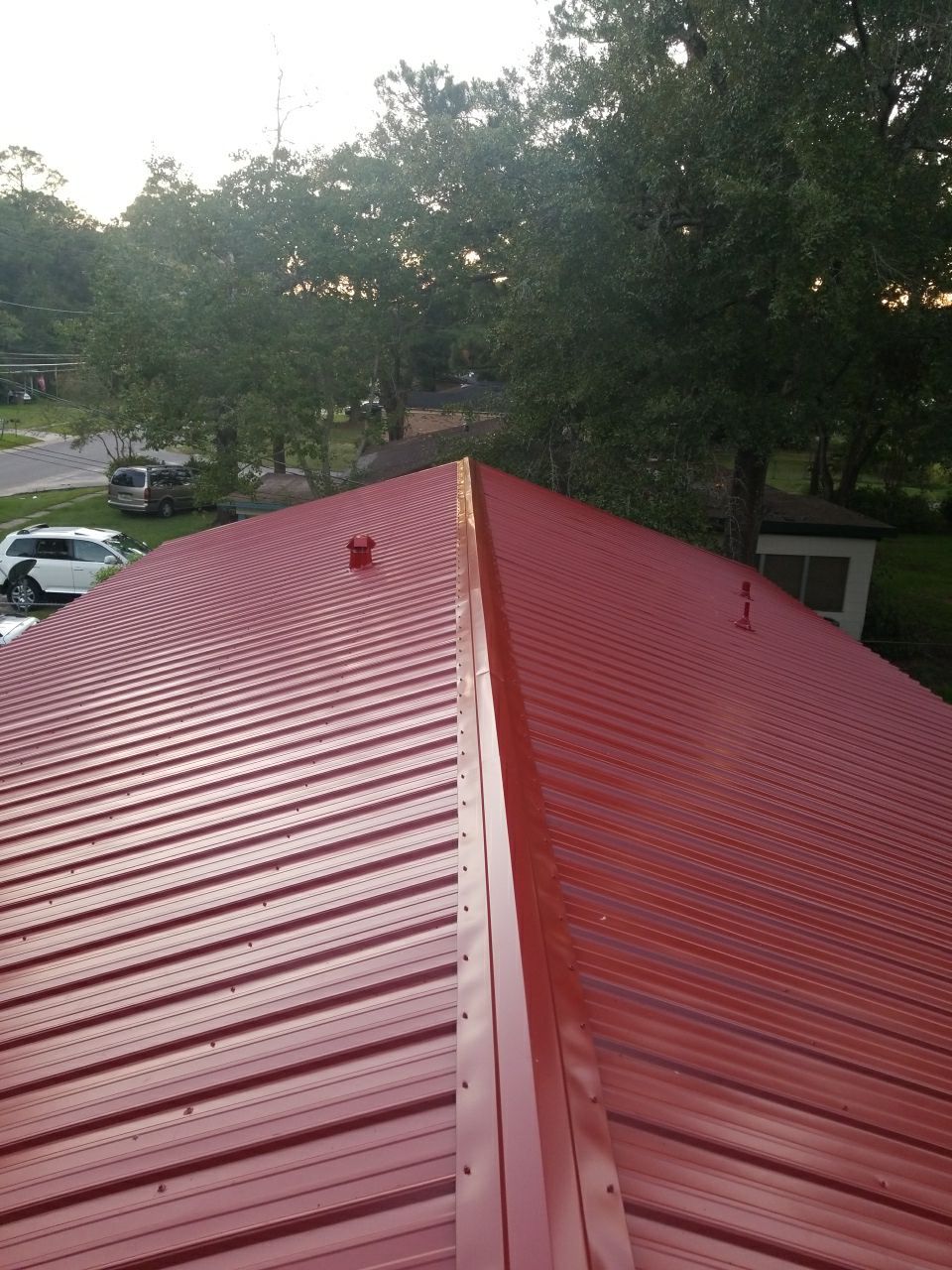 Residential Roofing Installation using Metal roofing by American Roofing & Construction LLC