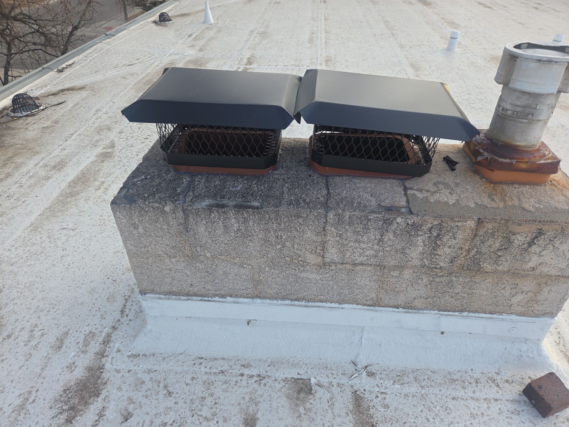  New Chimney Caps by RTP Roofing Company
