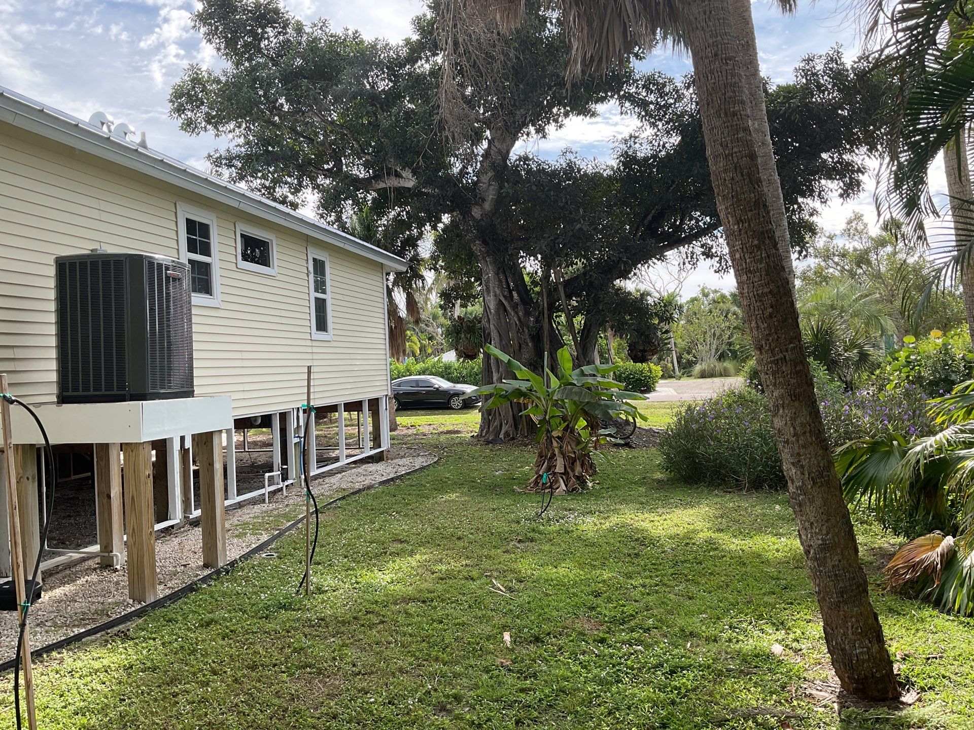 White K-Style Gutters for Beach Homes in Sanibel FL by Gutter Professors