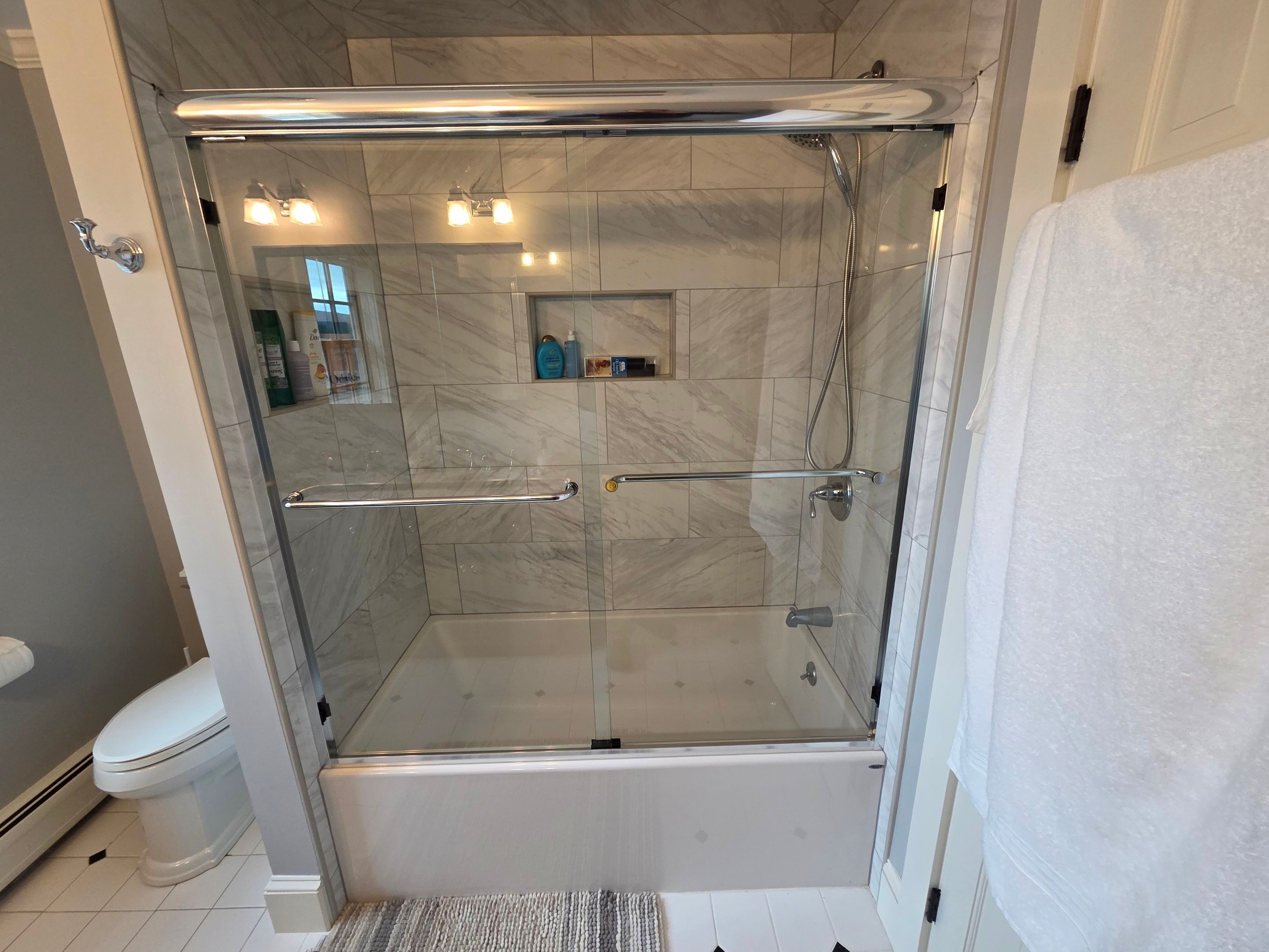 Shower using Alumax Shower by Cheshire Glass Company