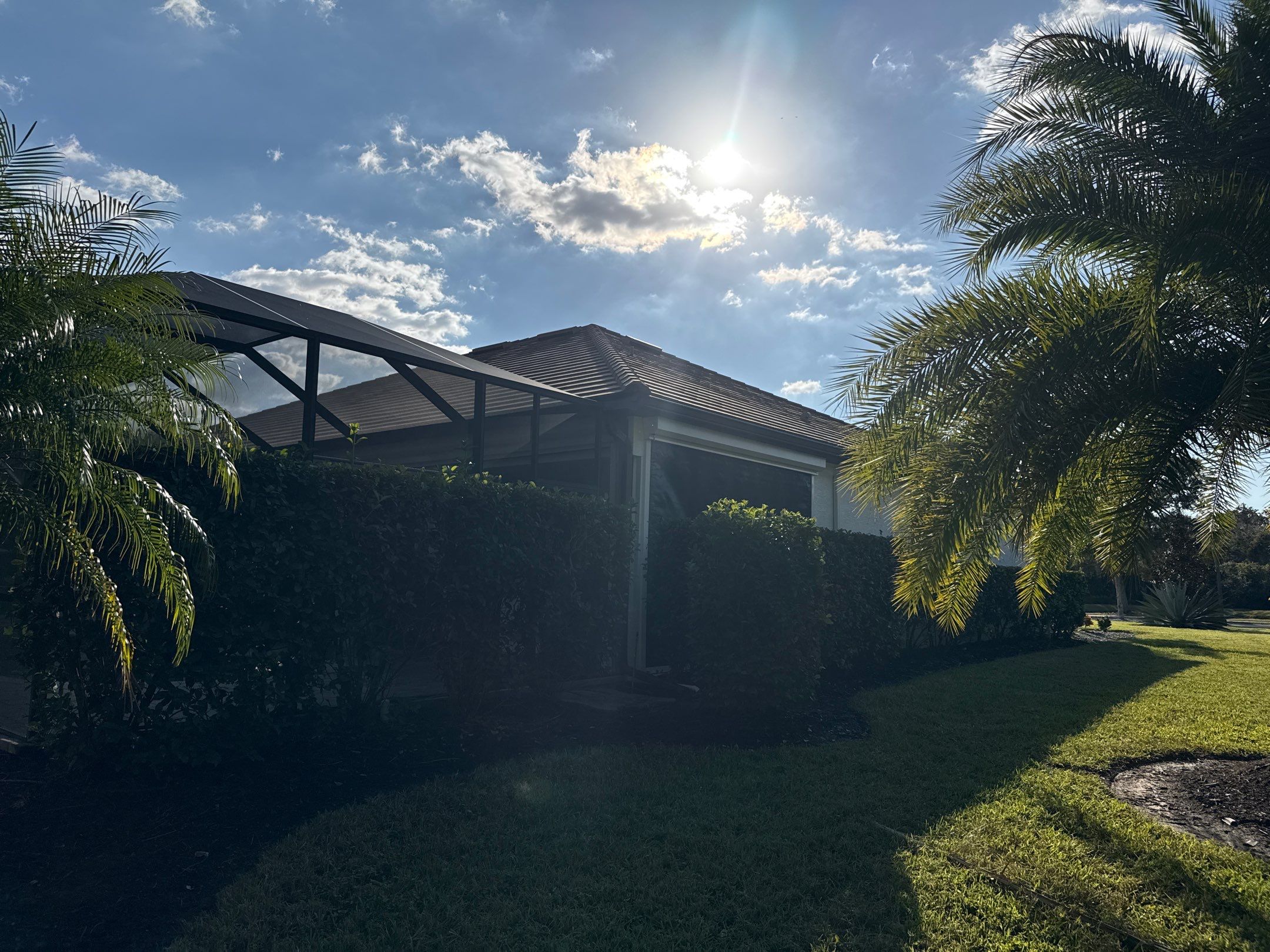 Flat Tile Roof, Paver Pool Deck & Driveway Cleaning | Cove at Twin Rivers, Parrish FL by Sunshine AquaWash