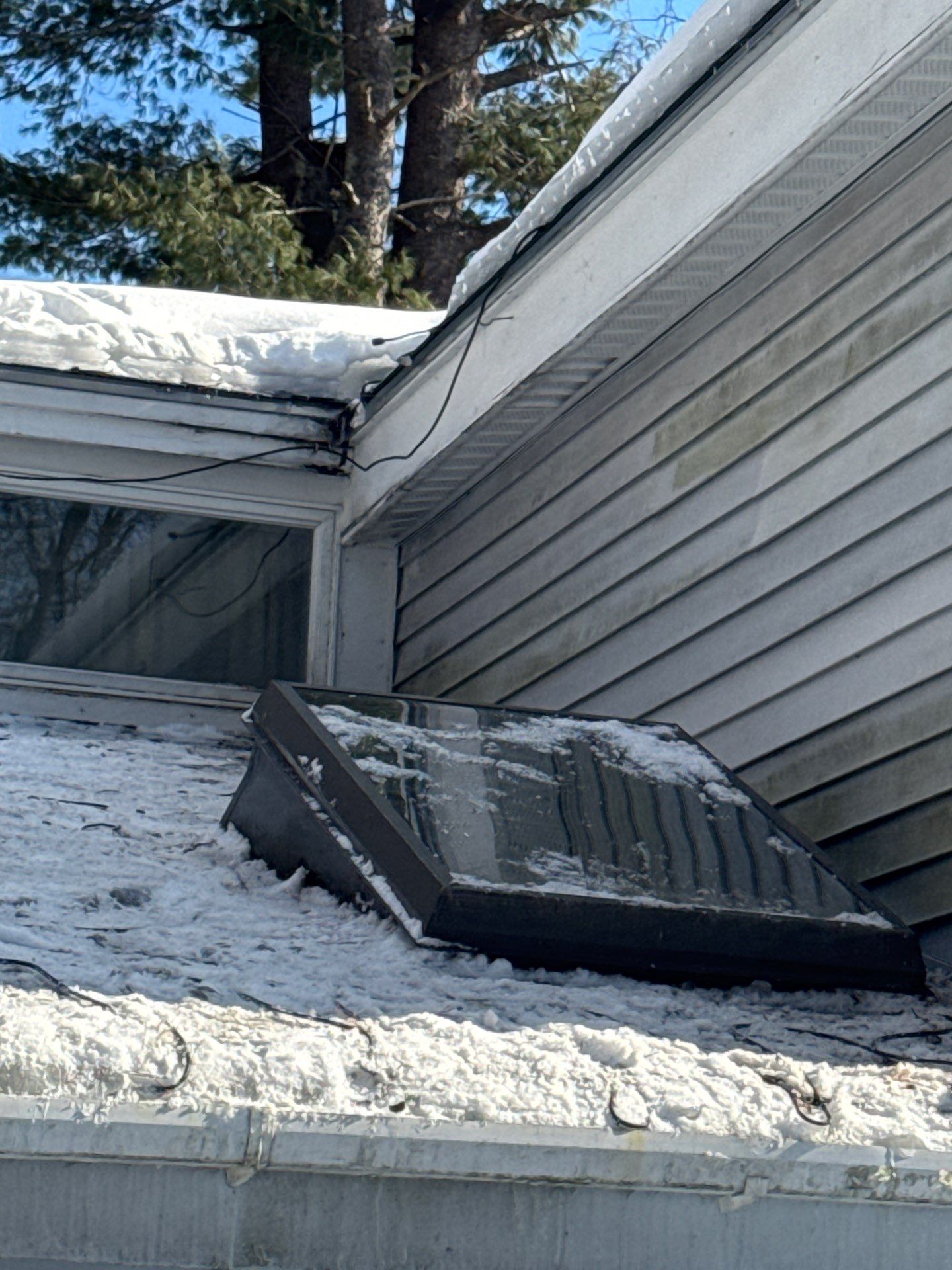 Ice Dam Removal, Snow Removal & Sidewall Flashing Repair in Acton, MA  by Mighty Dog Roofing of Greater Middlesex County