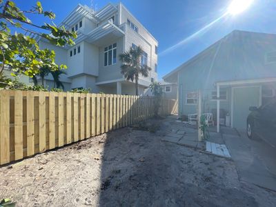 Wood Fence Installation using Shadowbox Wood Fence