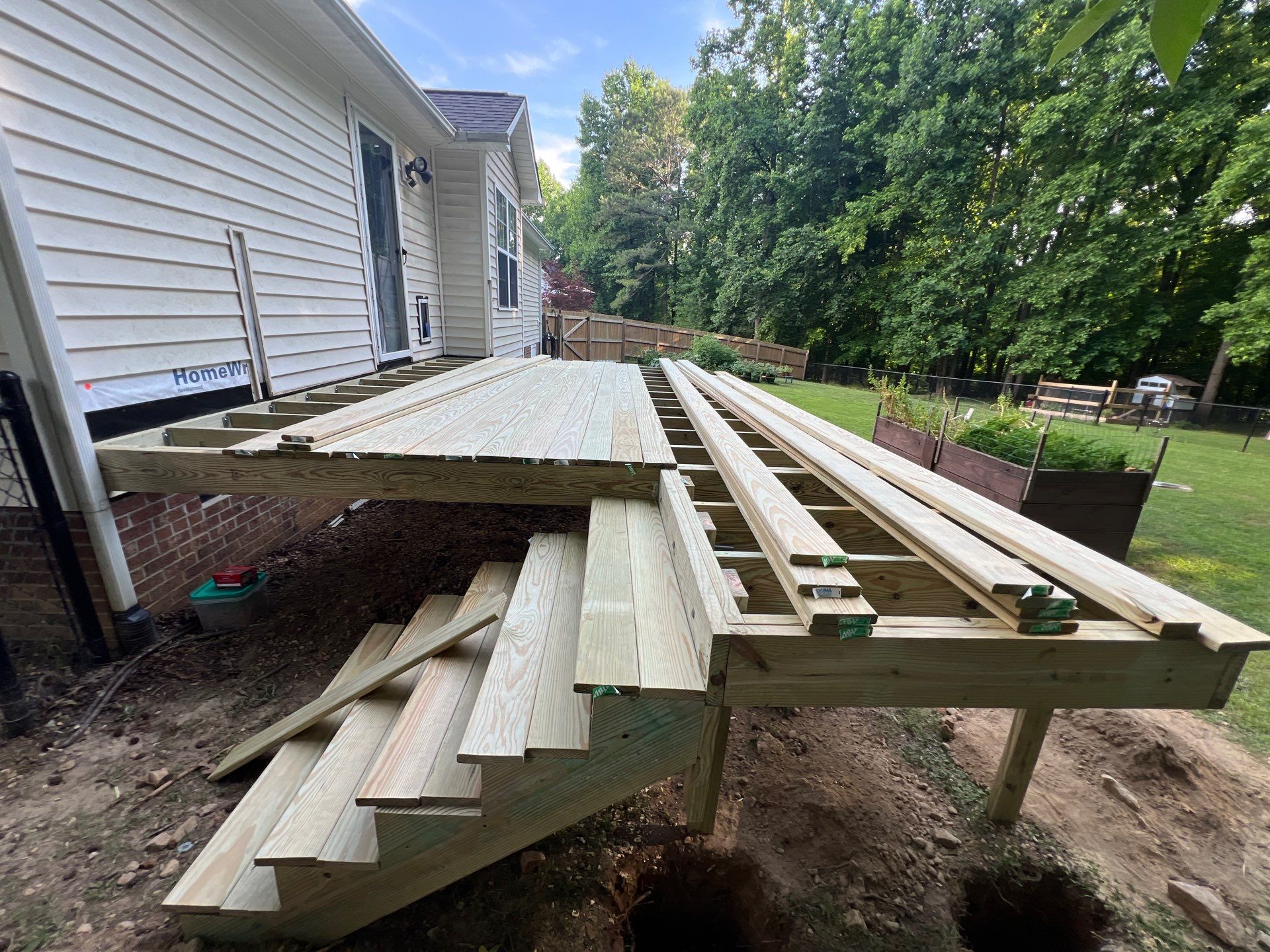 Deck Expansion and Sliding Glass Door Installation in Clayton by The Remodeling Company